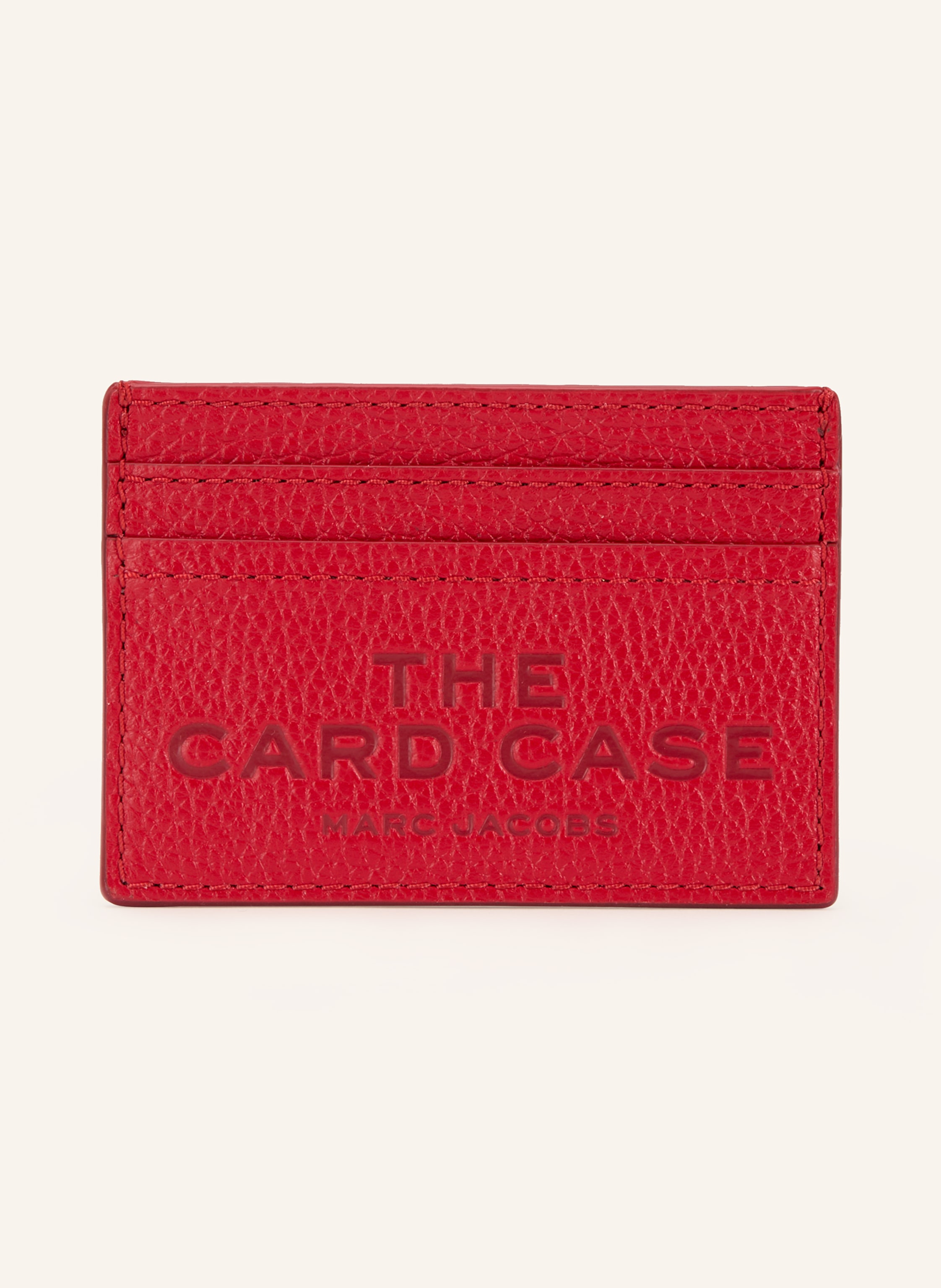 Marc Jacobs Genarbtes Leder. Geprägtes Label-Wording auf der Front. Ein Innenfach. Vier Steckfächer. Label-Badge auf der Rückseite in rot