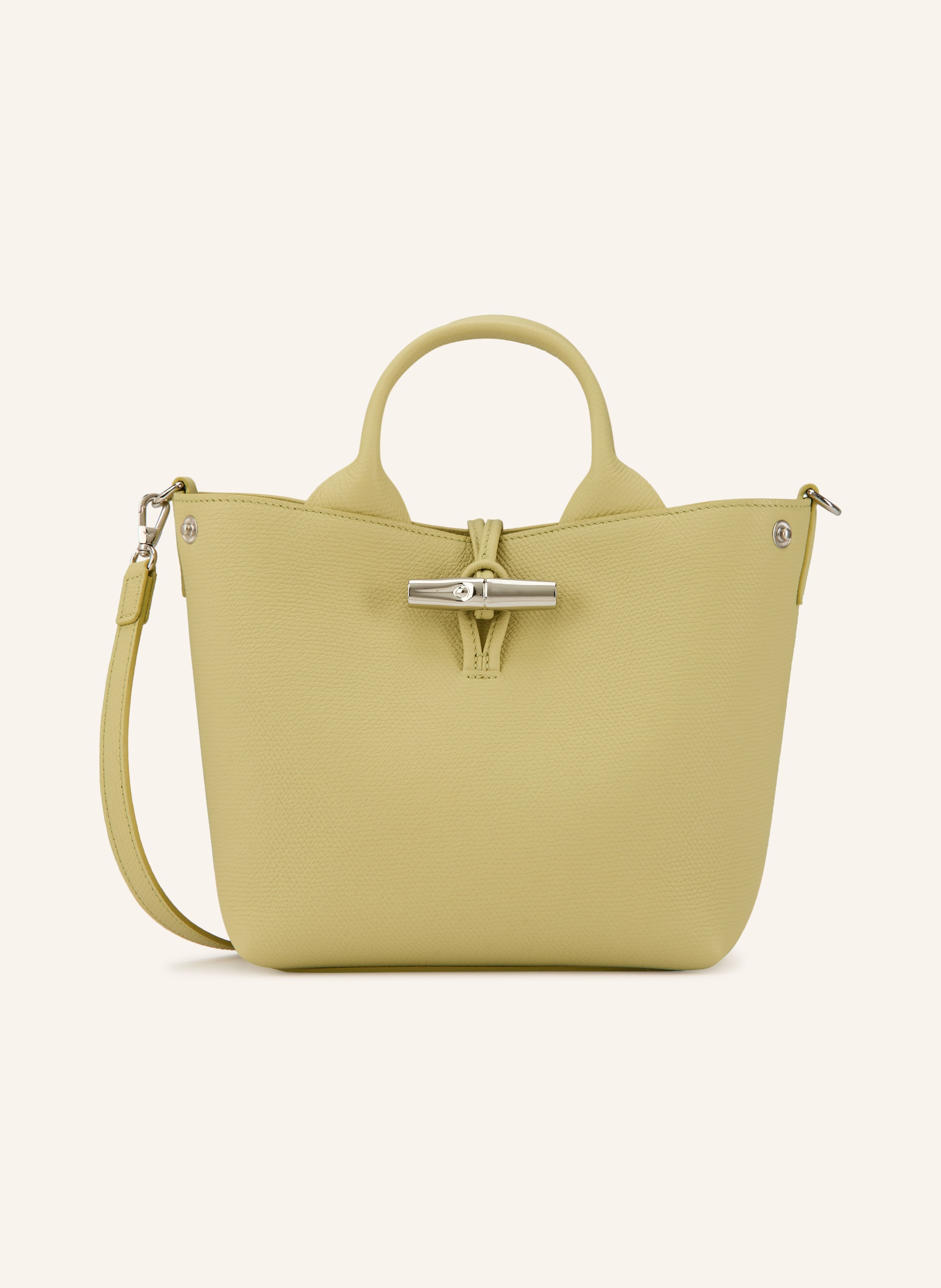 Longchamp Genarbtes Leder. Schließt mit Durchzugverschluss. Zwei Tragegriffe. Abnehmbarer, längenverstellbarer Schulterriemen. Innen ein Hauptfach. Ein Seitensteckfach mit Reißverschluss innen. Ein Seitensteckf Small in hellgrün