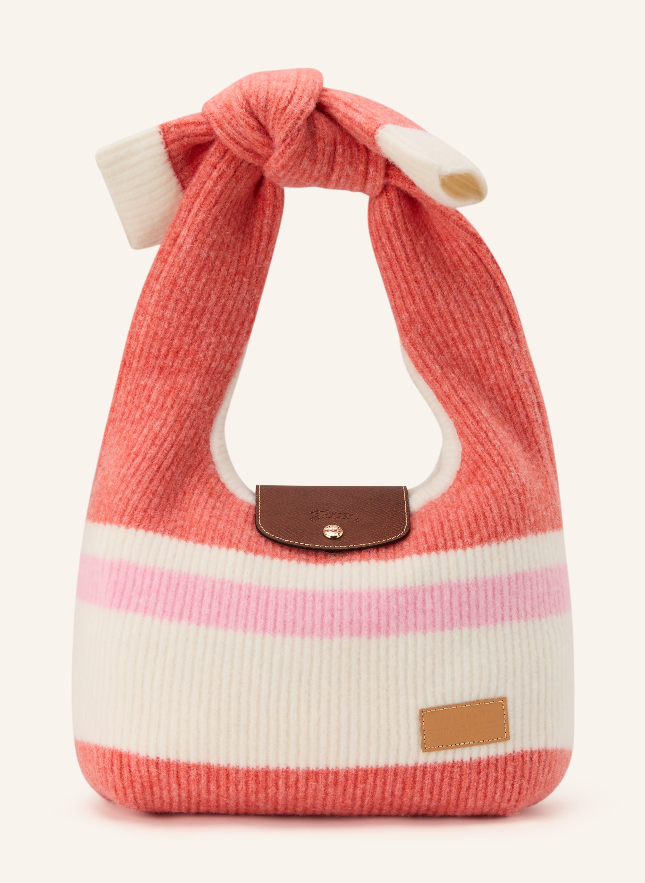 Longchamp Ein Steckfach. Innen ein Hauptfach. Druckknopf. Leder. Streifenmuster in lachs / rosa / ecru