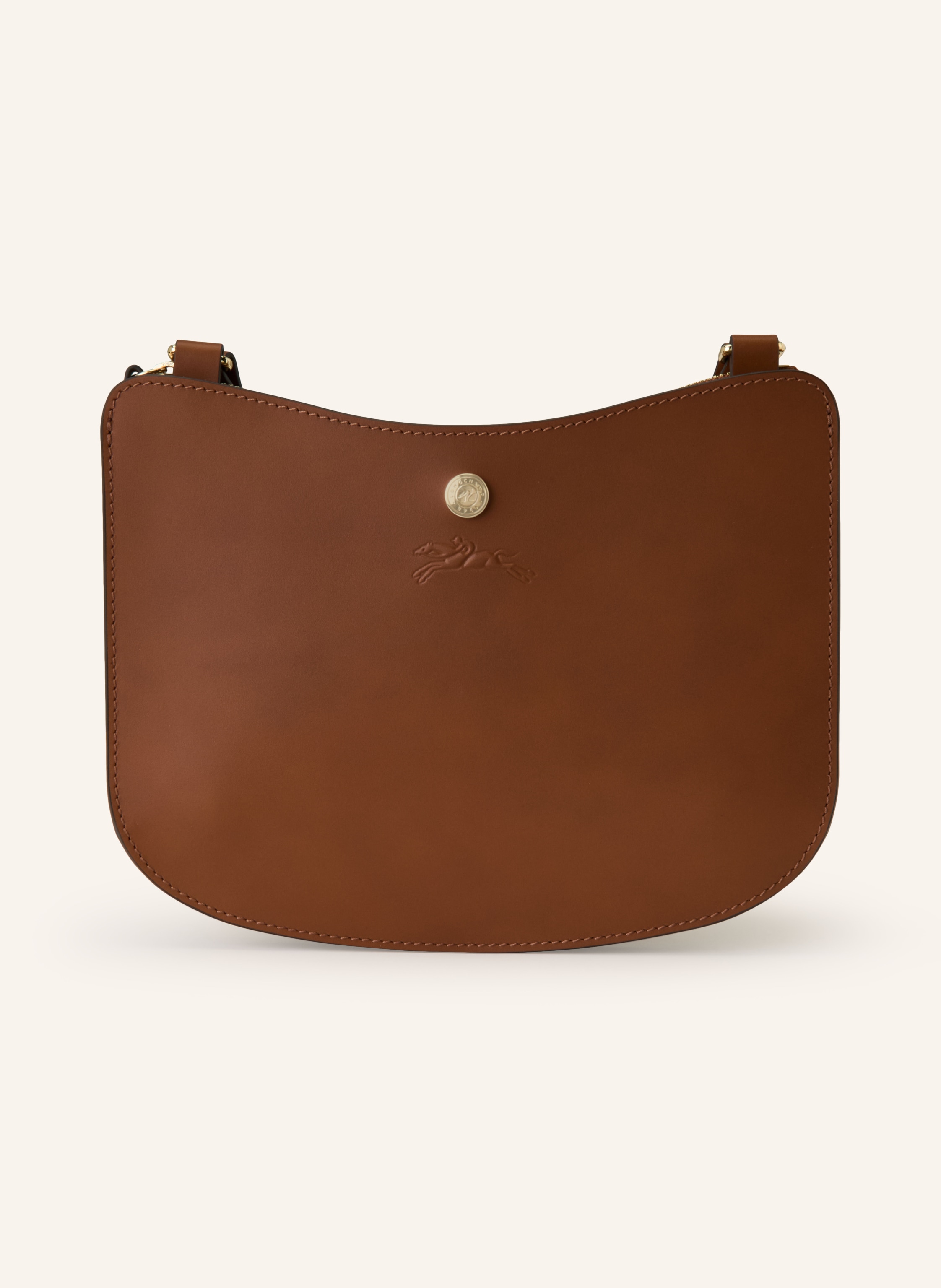 Longchamp Außenfach auf der Vorderseite. Ein Steckfach. Längenverstellbarer Schulterriemen. Reißverschluss. Innen ein Hauptfach. Label-Detail. Glattleder. Unifarben in braun