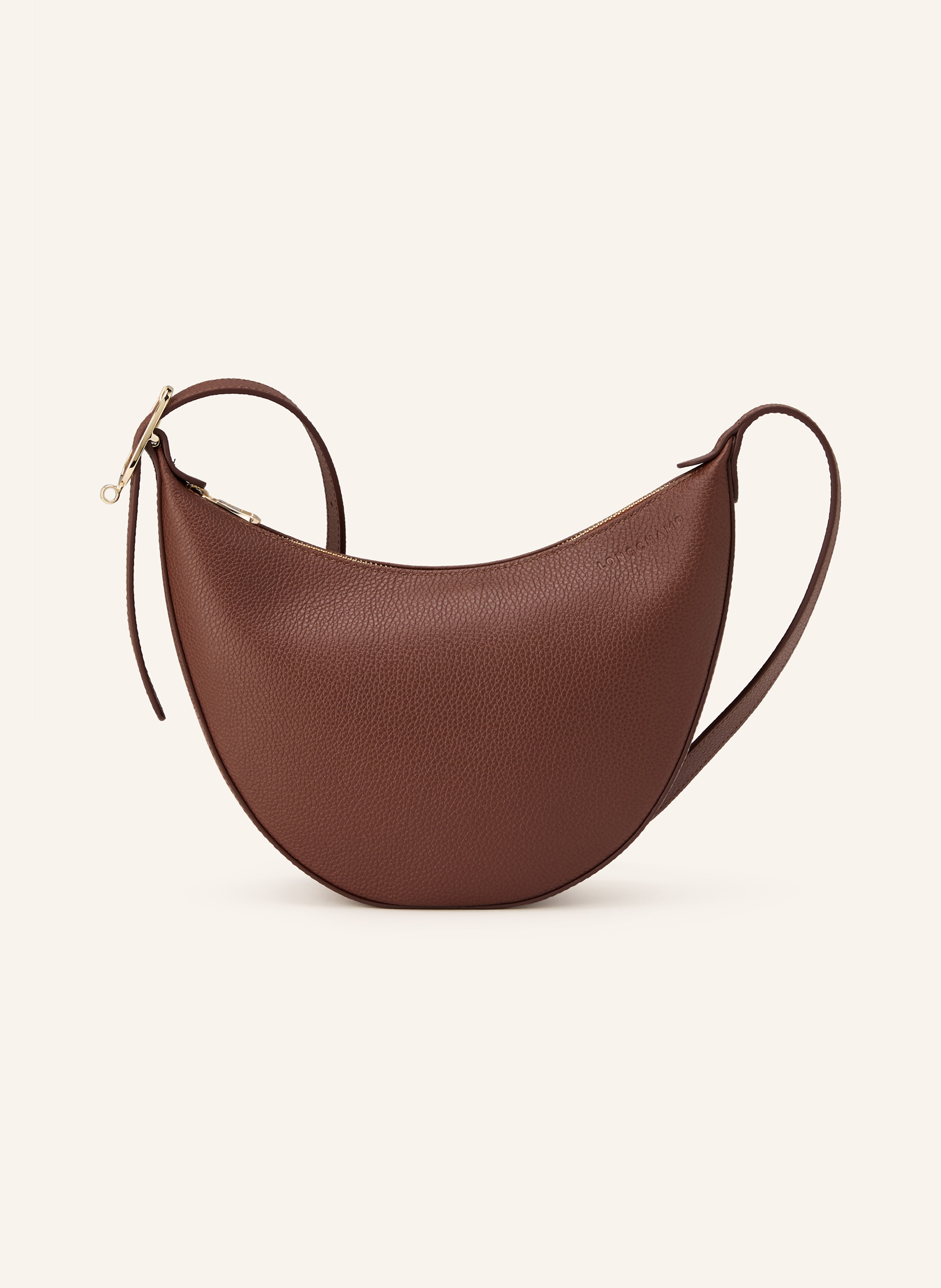Longchamp Ein Innenfach mit Reißverschluss. Innen ein Hauptfach. Längenverstellbarer Schulterriemen. Reißverschluss. Label-Print. Fein genarbtes Leder. Unifarben in braun