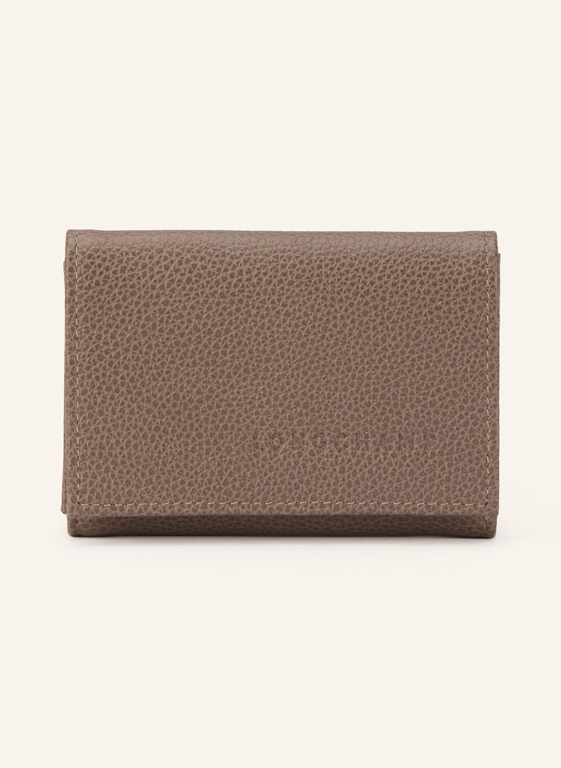 Longchamp Innen ein Hauptfach. Münzfach mit Druckknopf. Druckknopf. Label-Detail. Fein genarbtes Leder. Unifarben. Sechs Kartenfächer in taupe