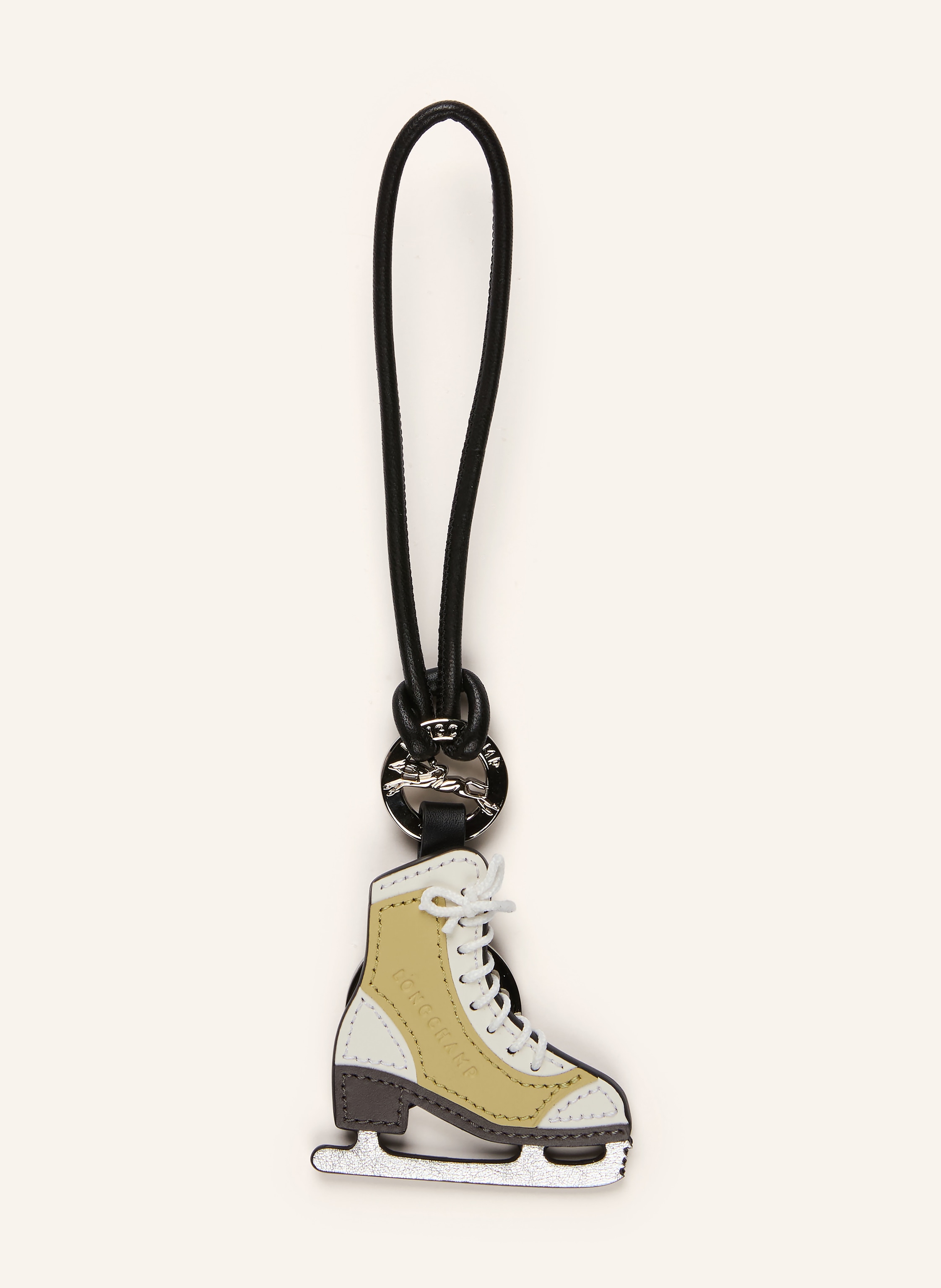 Longchamp Label-Wording. Glattleder. Silberfarbene Metalldetails. Allover-Muster in schwarz