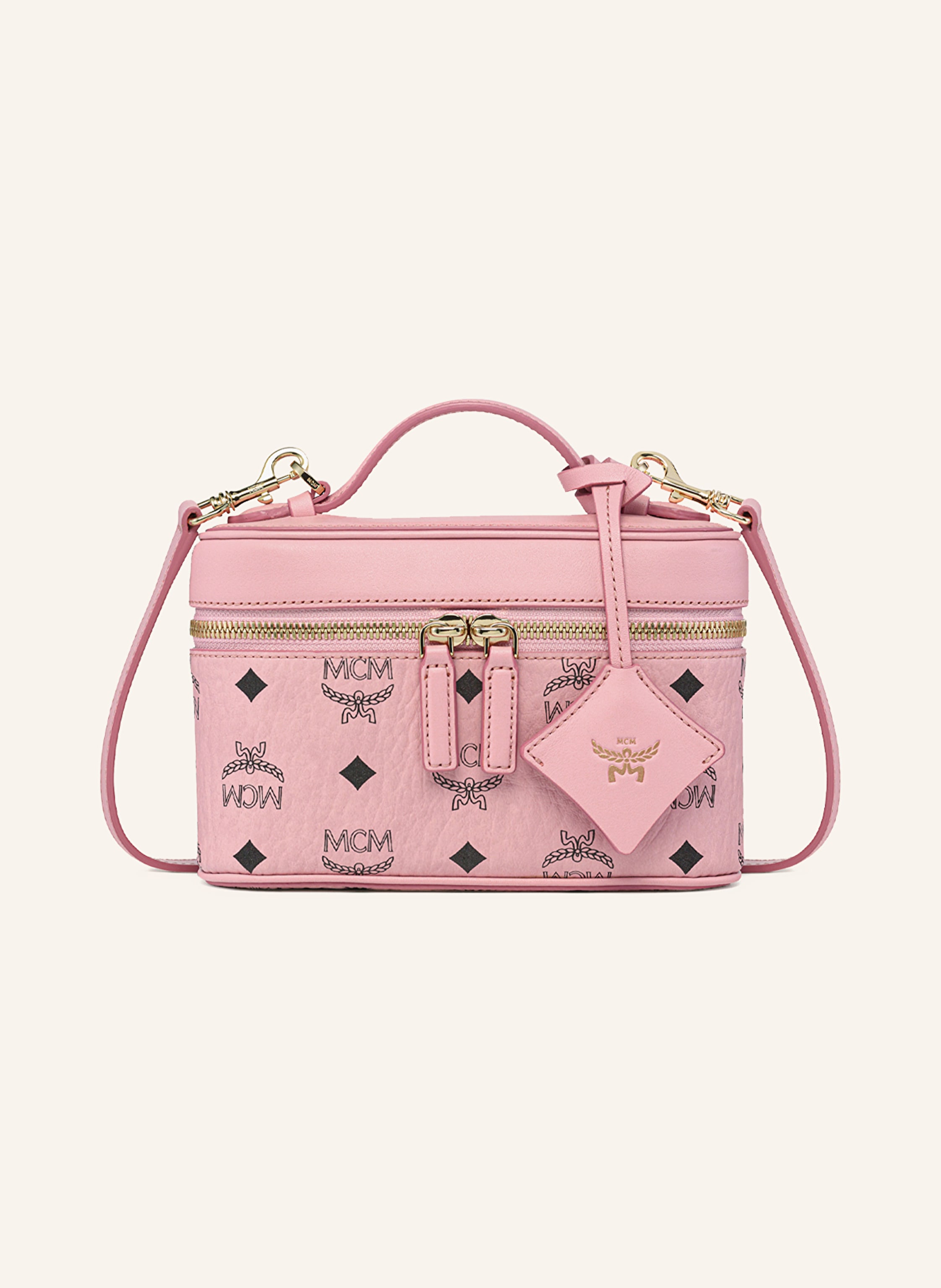 MCM Anhänger. Ein Kartenfach. Innen ein Hauptfach. Abnehmbarer Schulterriemen. Ein Tragegriff. Höhenverstellbarer Teleskopgriff. Längenverstellbarer Schulterriemen. Verstärkter Taschenboden. Zwei-Wege-Rei in rosa / gold / schwarz