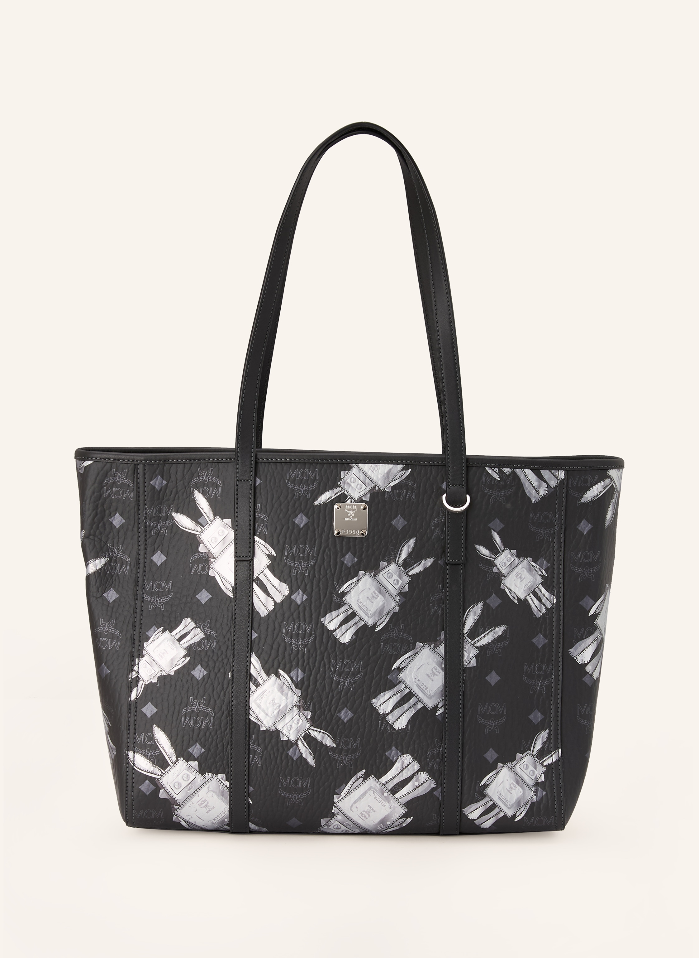 MCM Innen ein Hauptfach. Zwei Steckfächer. Zwei Tragegriffe. Verstärkter Taschenboden. Reißverschluss. Label-Print. Beschichtetes Canvas. Glattleder. Allover-Muster Medium in schwarz / silber