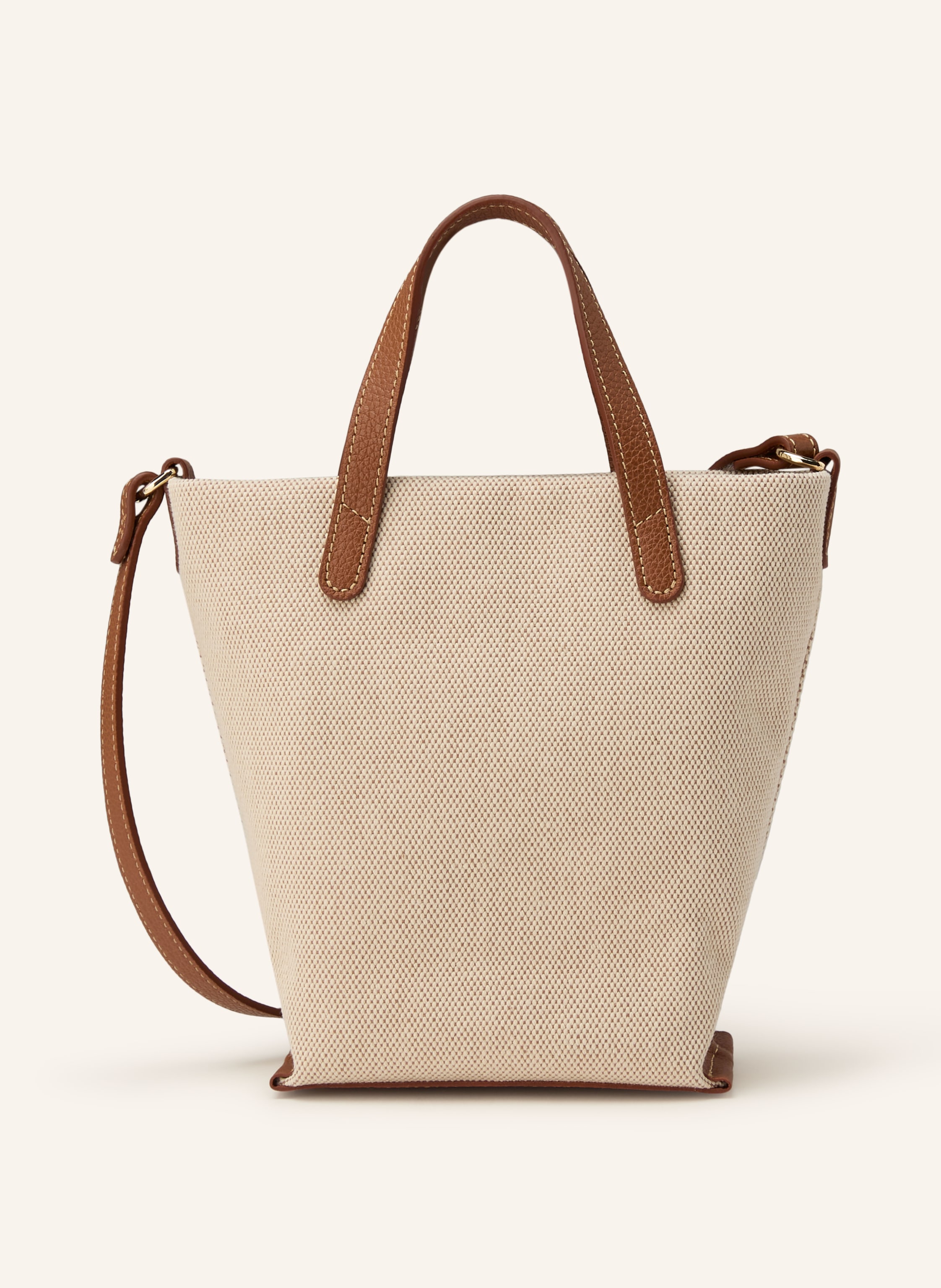 Longchamp Außenfach auf der Vorderseite. Längenverstellbarer Schulterriemen. Verstärkter Taschenboden. Innen ein Hauptfach. Label-Wording. Beschichtetes Canvas. Genarbtes Leder. Bicolor-Design in creme / cognac