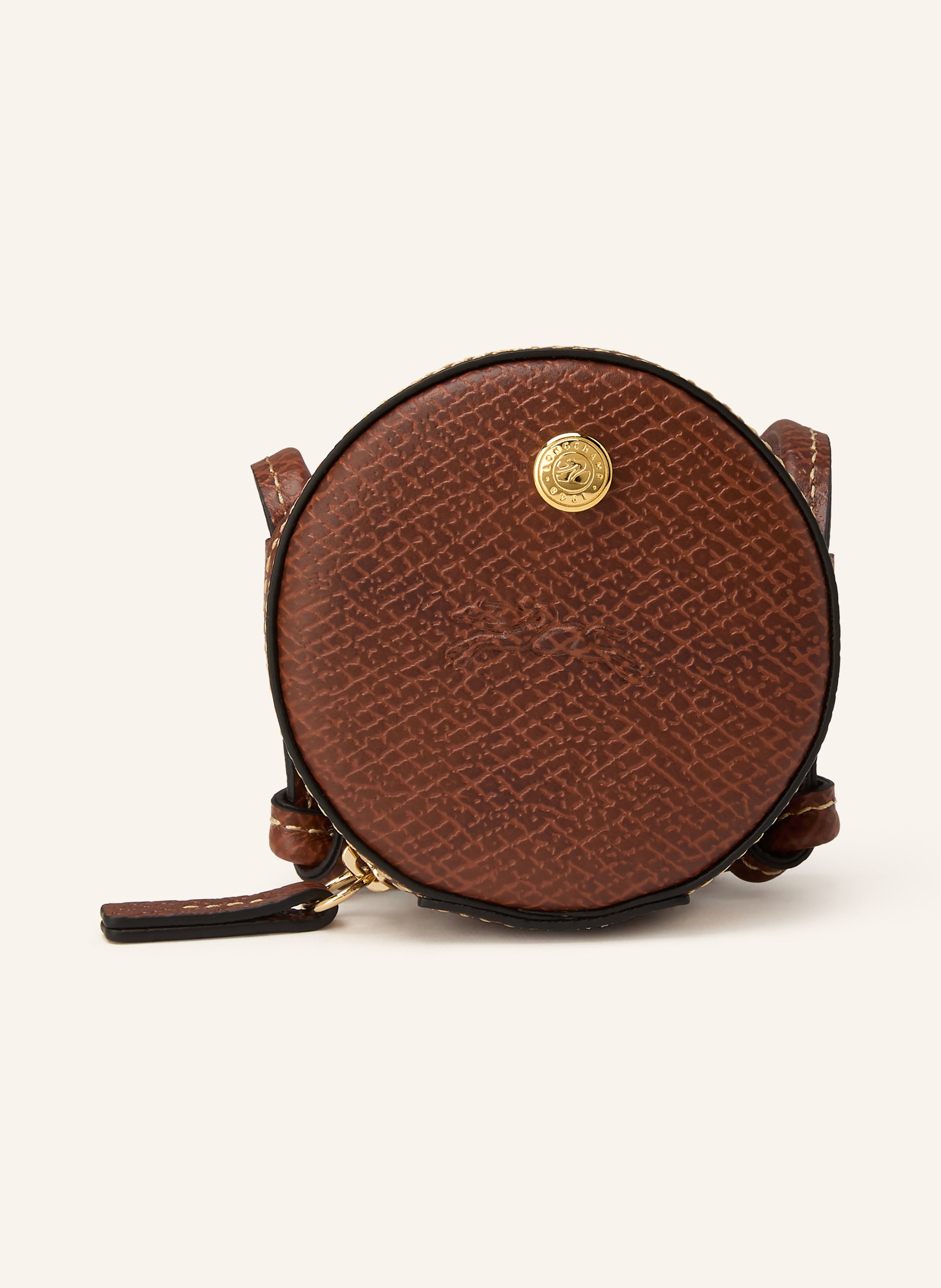 Longchamp Schlüsselanhänger. Ein Tragegriff. Verstärkter Taschenboden. Reißverschluss. Innen ein Hauptfach. Label-Details. Leder mit Animal-Struktur. Animal-Muster in braun / gold