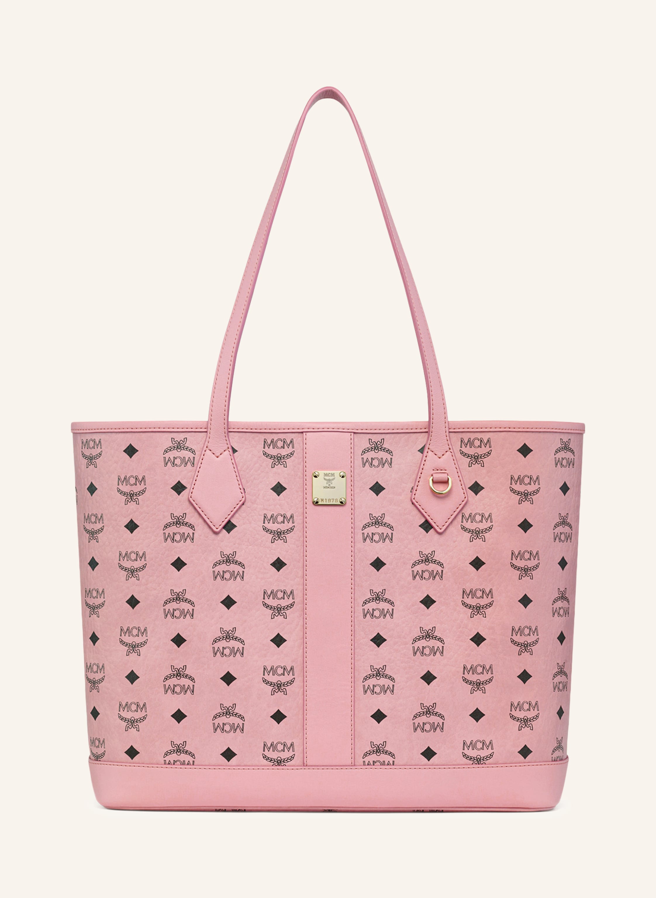 MCM Herausnehmbare Pouch. Zwei Tragegriffe. Schutzfüßchen. Hakenverschluss. Innen ein Hauptfach. Label-Detail. Beschichtetes Canvas. Lederdetails. Allover-Muster Medium in rosa / gold / schwarz