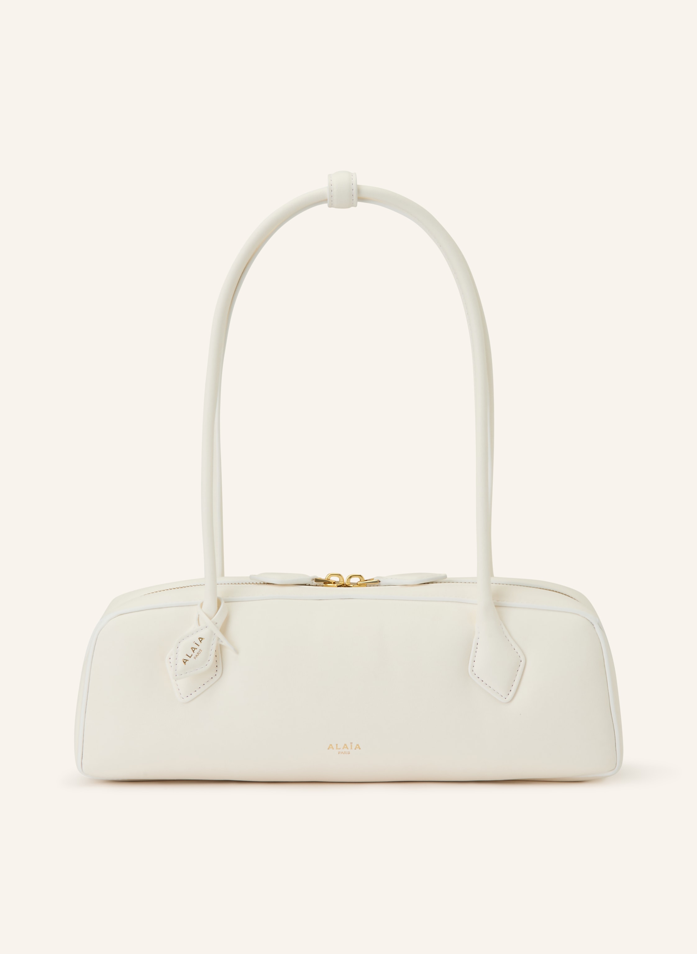Alaïa Ein Kartenfach. Tragegriff oben. Zwei Tragegriffe. Verstärkter Taschenboden. Zwei-Wege-Reißverschluss. Innen ein Hauptfach. Label-Wording. Fein genarbtes Leder. Unifarben. Made in Italy in weiss