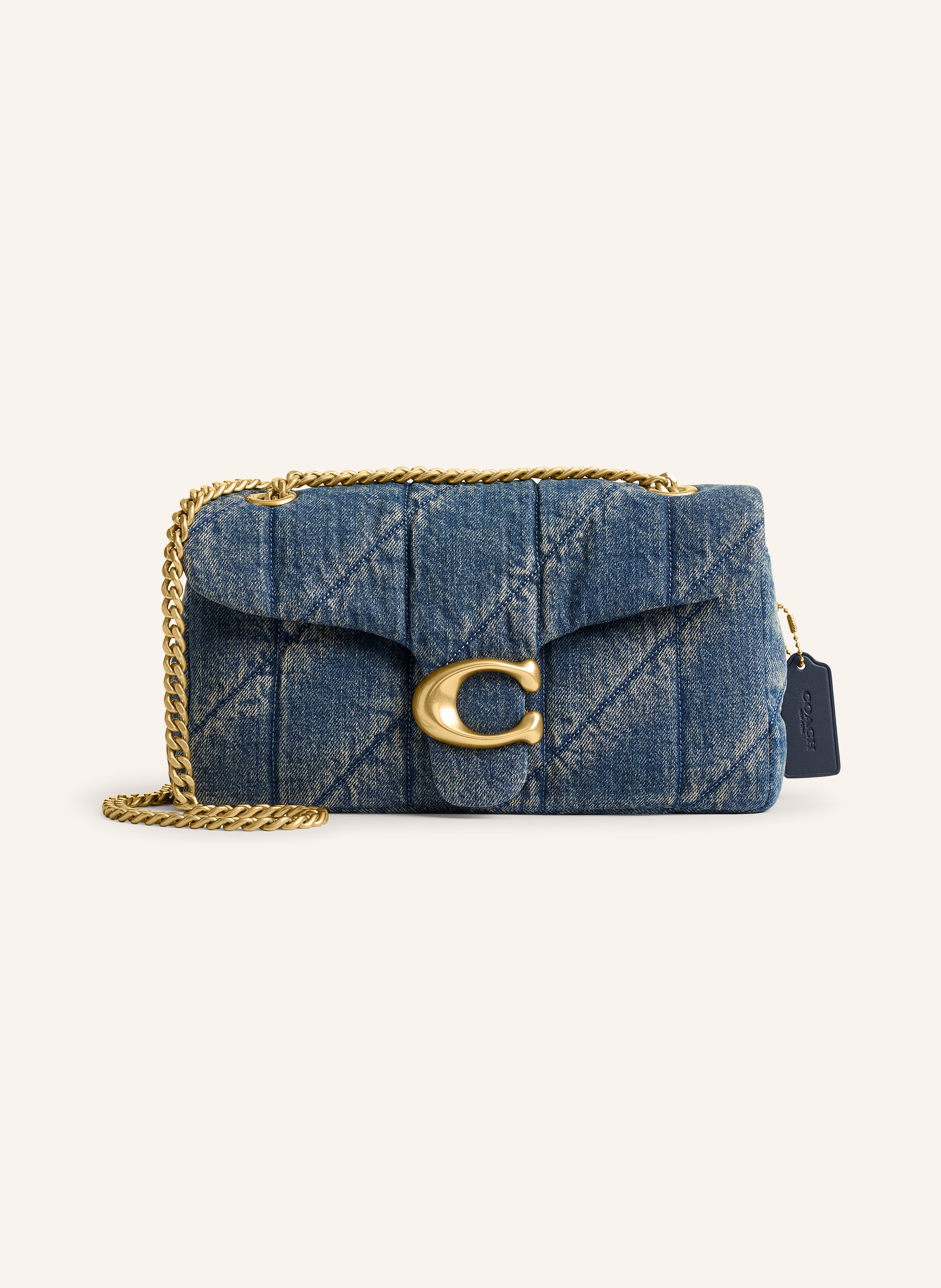 Coach Außenfach auf der Rückseite. Außenfach unter dem Überschlag. Anhänger. Schulterkette kann einzeln oder doppelt getragen werden. Logo-Schließe. Innen zwei Hauptfächer. Label-Detail. Textil. Unifarben. in blau
