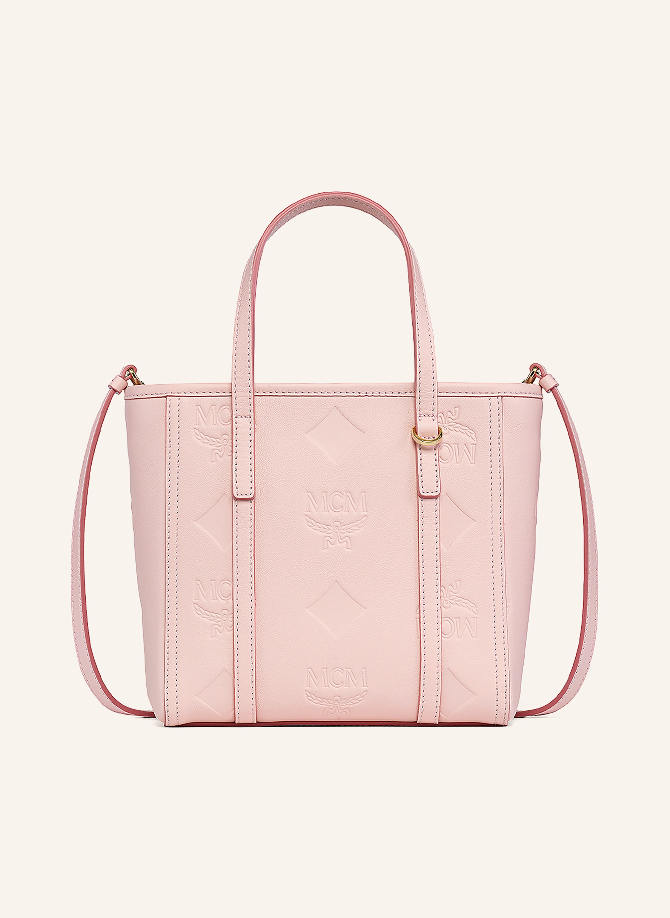 MCM Ein Steckfach. Abnehmbarer Schulterriemen. Längenverstellbarer Schulterriemen. Zwei Tragegriffe. Verstärkter Taschenboden. Reißverschluss. Innen ein Hauptfach. Label-Details. Fein genarbtes Leder. Mon Mini in hellrosa