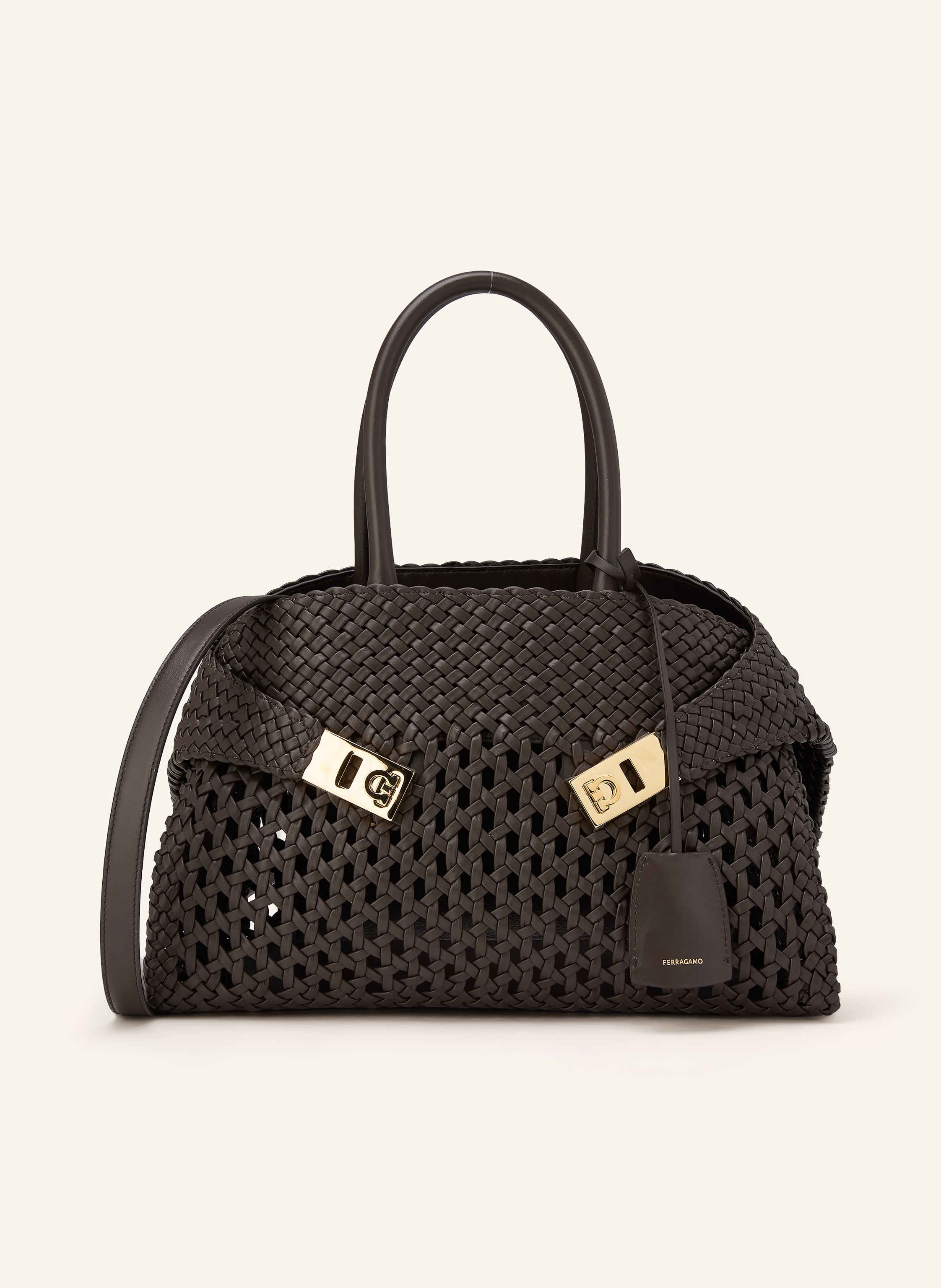 Ferragamo Ein Steckfach. Abnehmbarer Schulterriemen. Zwei Tragegriffe. Stellfüßchen. Innen ein Hauptfach. Label-Anhänger. Glattleder. Unifarben. Geflochtenes Design. Made in Italy in dunkelbraun / gold