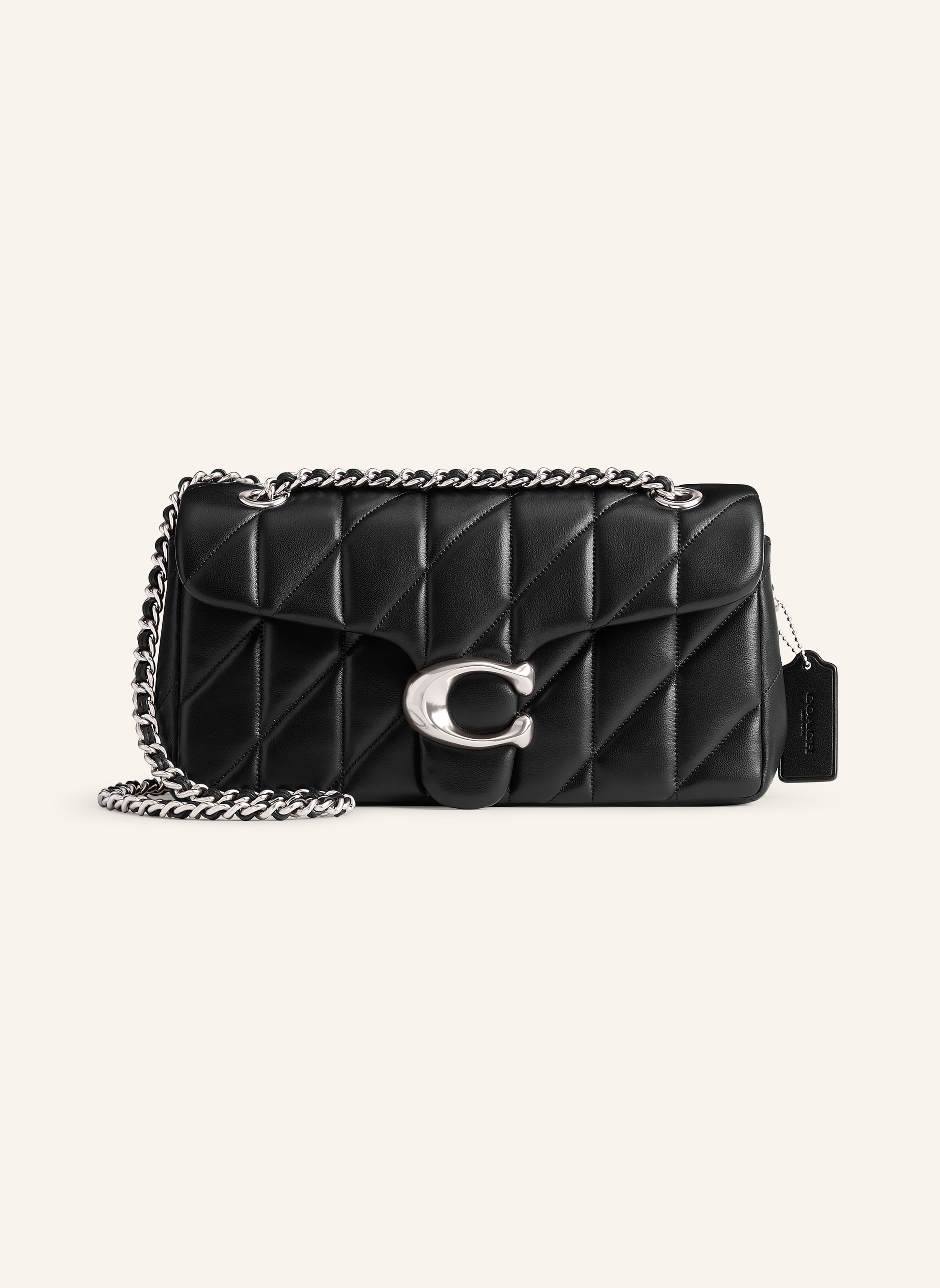 Coach Glattleder. Gestepptes Design. Schließt mit Steckschließe. Schulterkette kann einzeln oder doppelt getragen werden. Außenfach mit Magnetverschluss auf der Vorderseite. Innen zwei Hauptfächer. Innenfac in schwarz