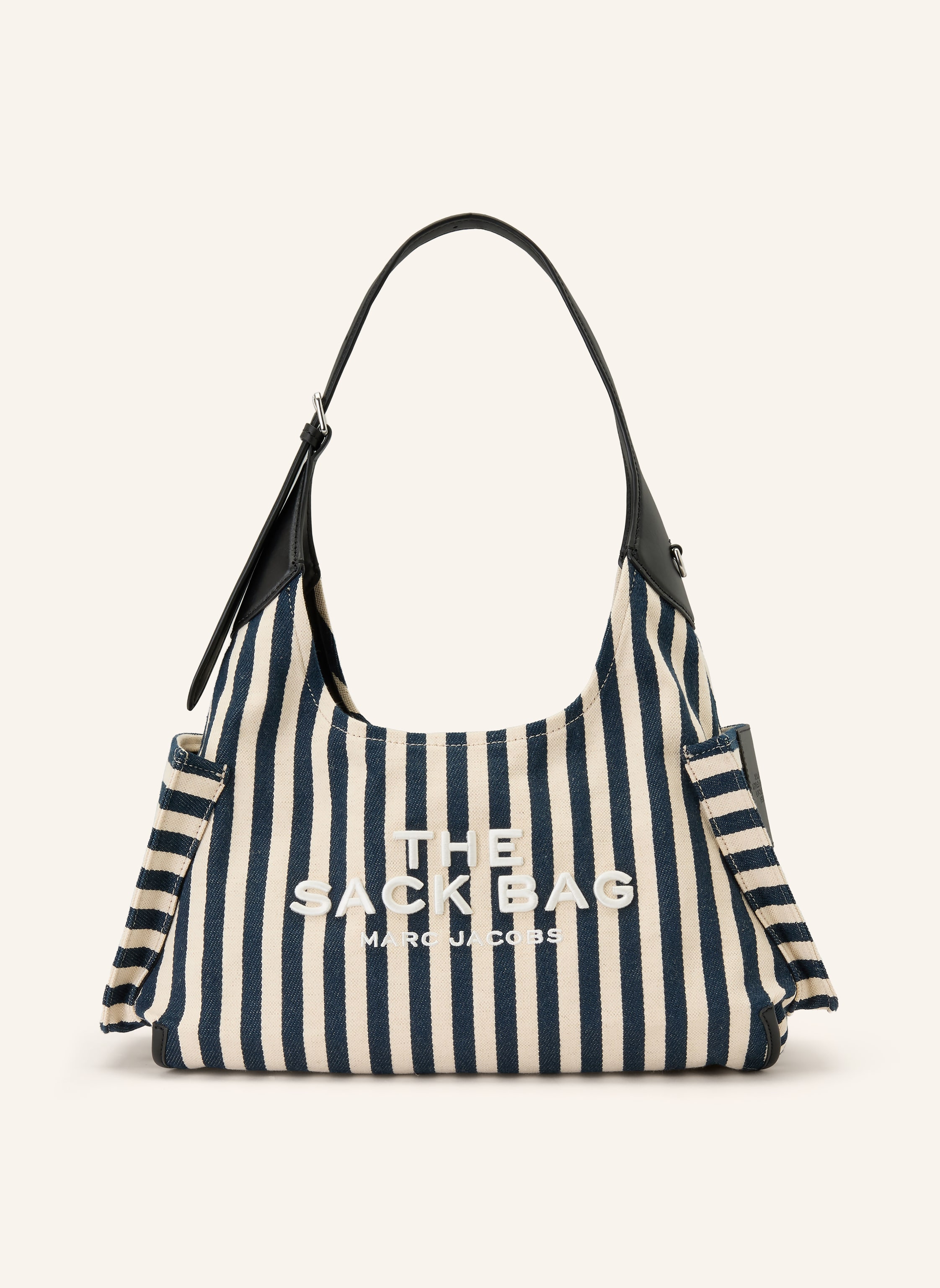 Marc Jacobs Seitliche Außenfächer. Ein Innenfach mit Reißverschluss. Längenverstellbarer Schulterriemen. Karabinerverschluss. Innen ein Hauptfach. Label-Details. Glattleder. Textil. Streifenmuster. Lederdetails in beige / dunkelblau / schwarz