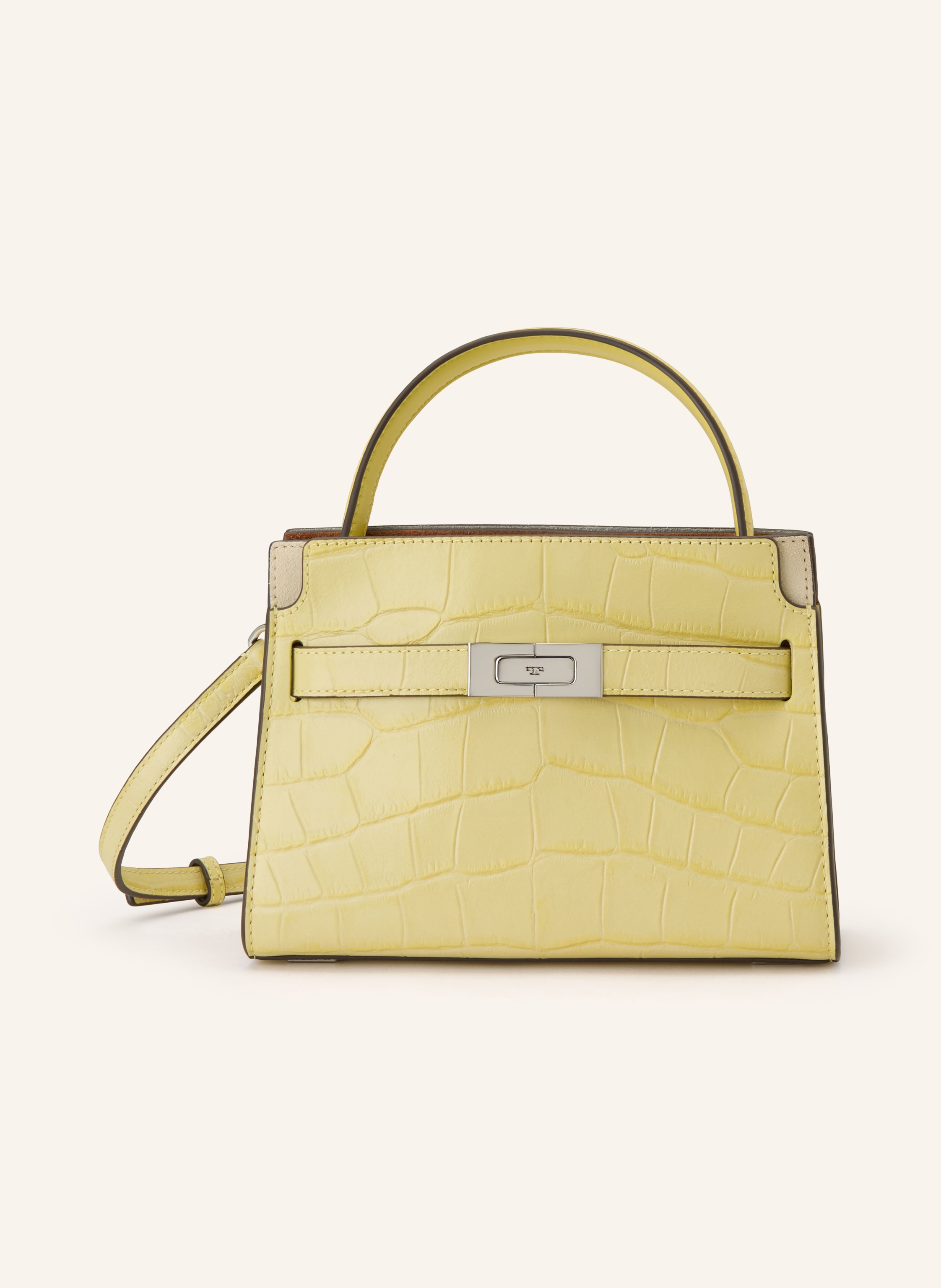 Tory Burch Ein Tragegriff. Längenverstellbarer Schulterriemen. Stellfüßchen. Verstärkter Taschenboden. Druckknopf. Steckschließe. Leder mit Animal-Struktur. Unifarben in hellgelb