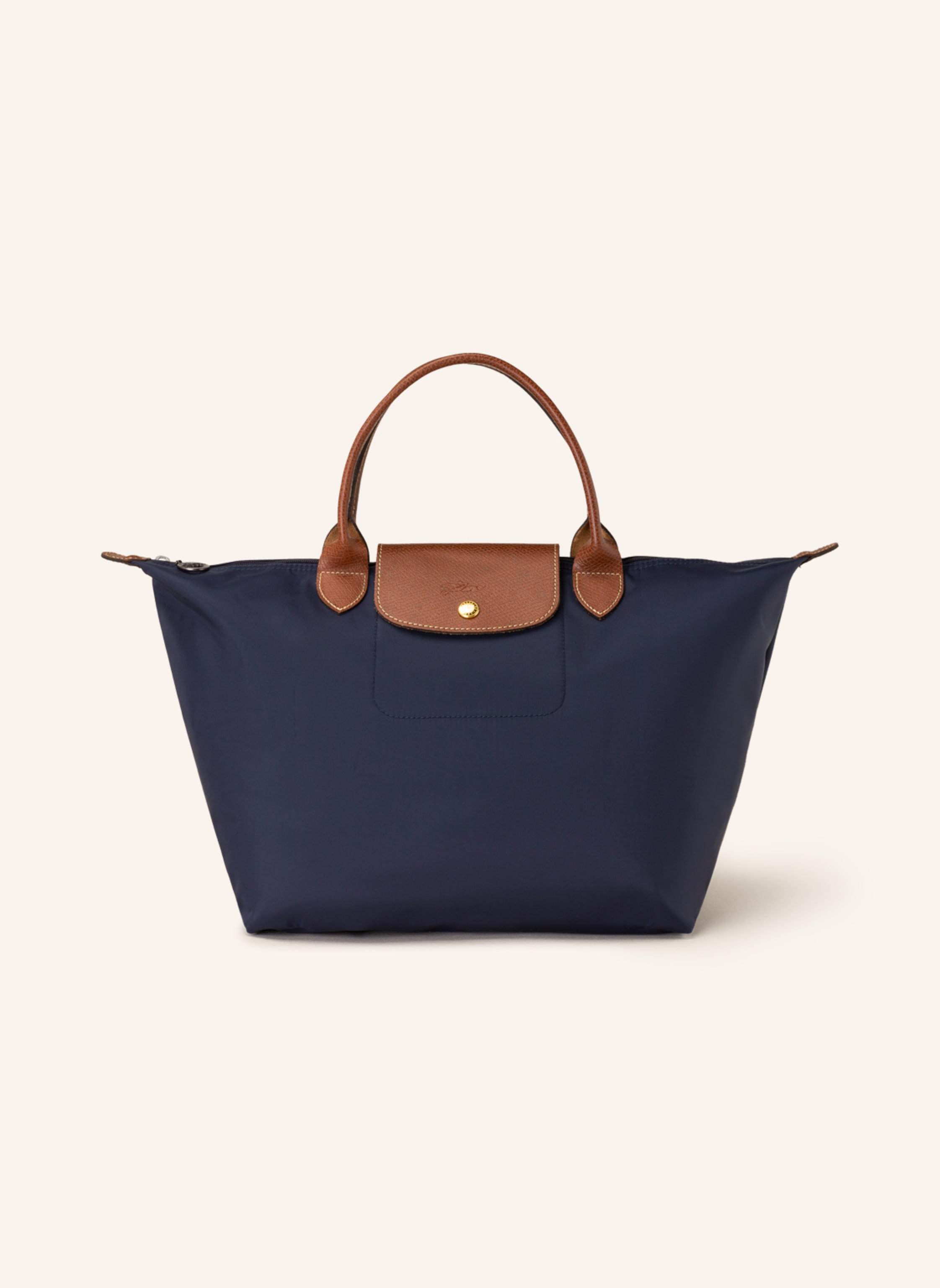 Longchamp Synthetik mit Lederdetails. Goldfarbene Metalldetails. Schließt mit einem Reißverschluss. Umschlag mit Druckknopf. Logo-Prägung. Faltbar in dunkelblau