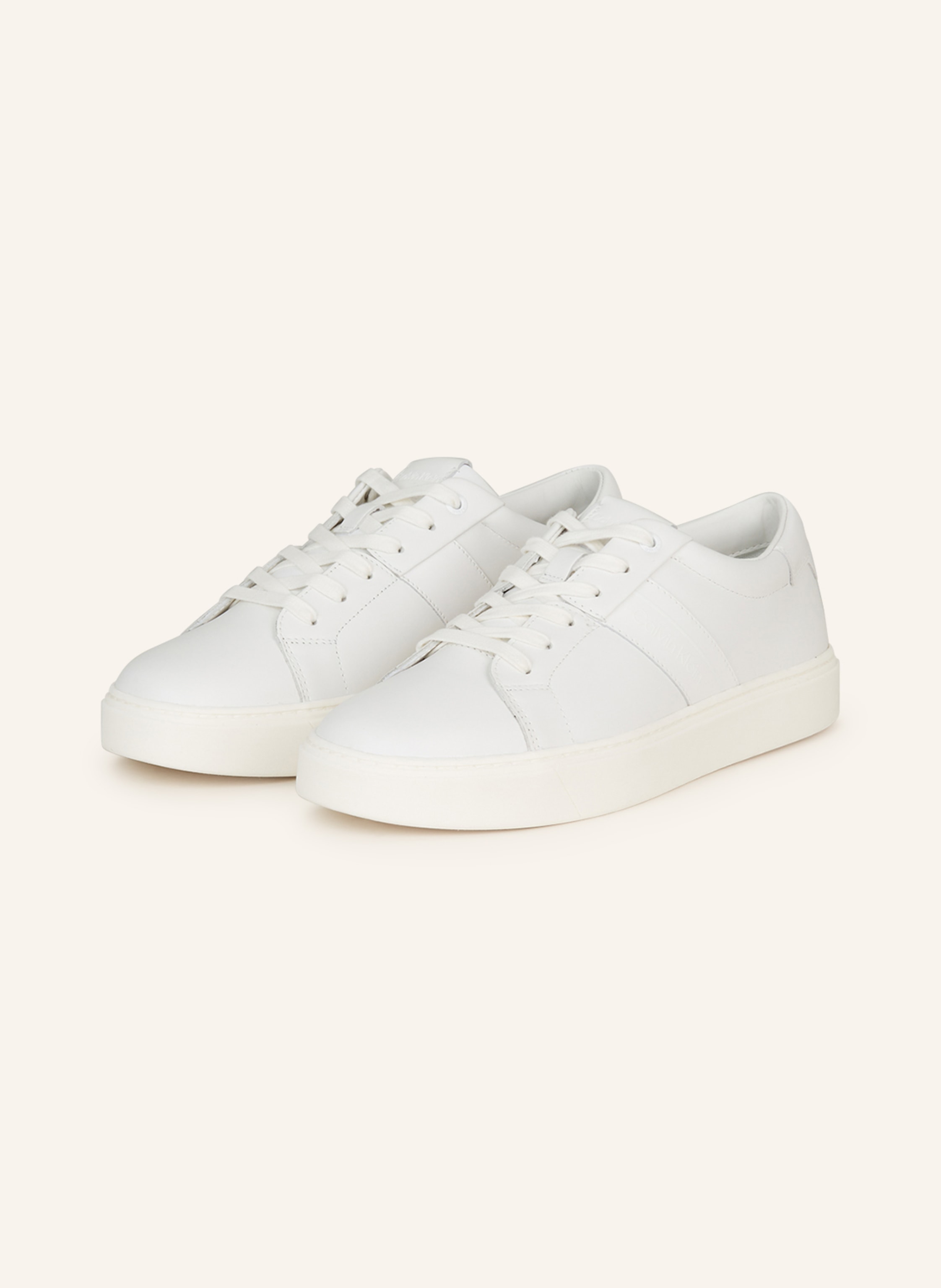 Witte calvin store klein sneakers