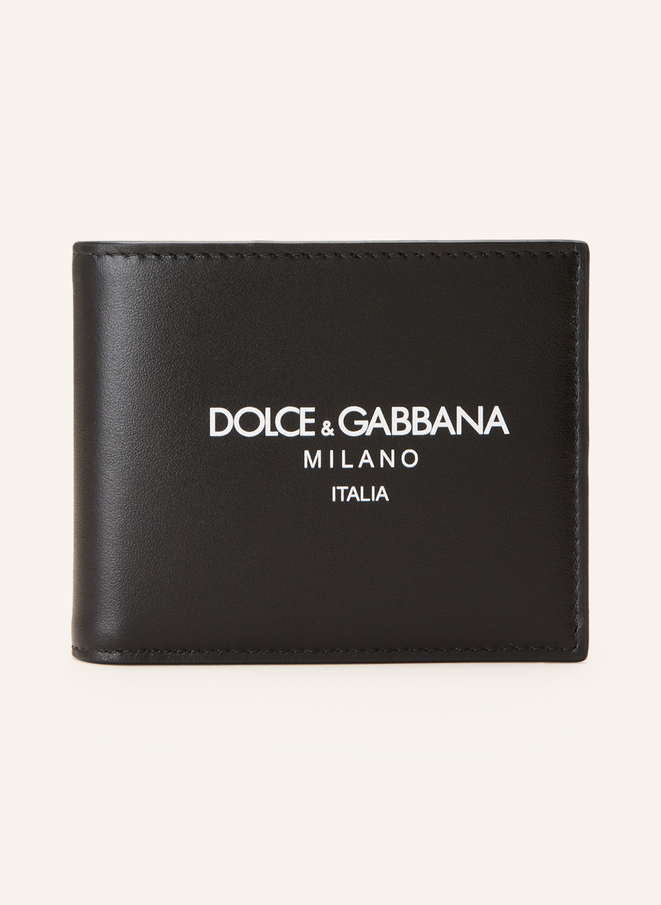 Dolce & Gabbana Glattleder. Bifold-Design. Münzfach mit Druckknopf. Steckfach für Scheine & Co. Drei Kartensteckfächer. Label-Wording. Made in Italy in schwarz
