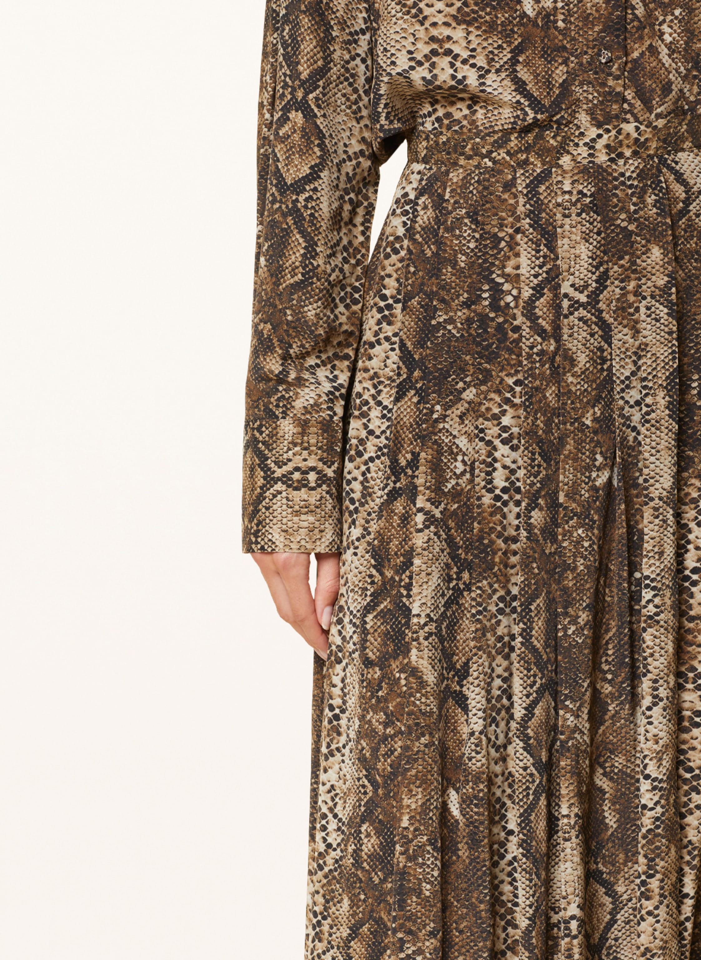 Thumbnail - Mrs & Hugs Rock braun