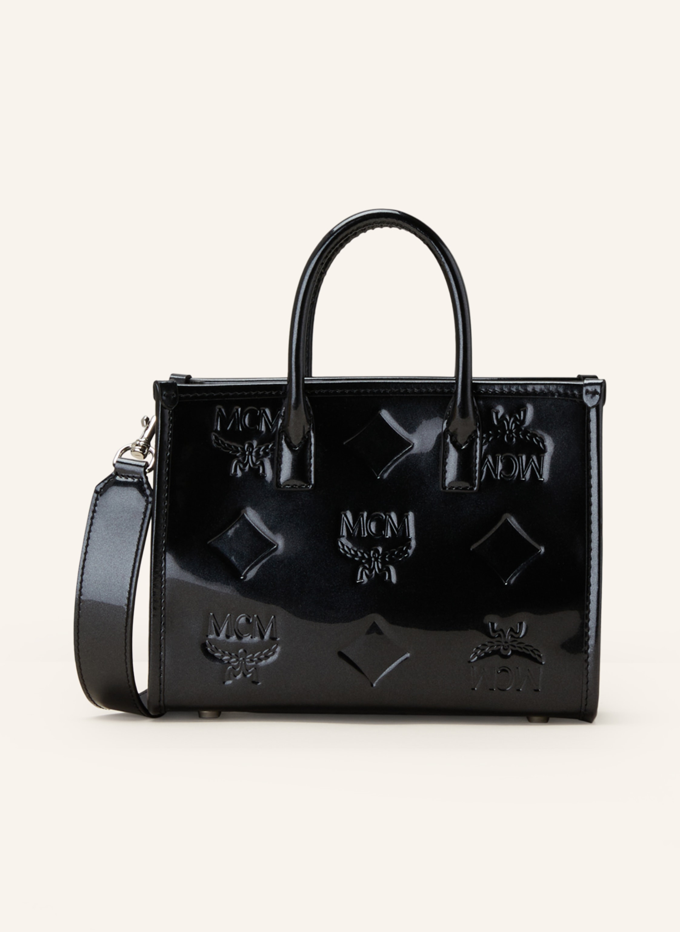 Silver and black top mcm bag