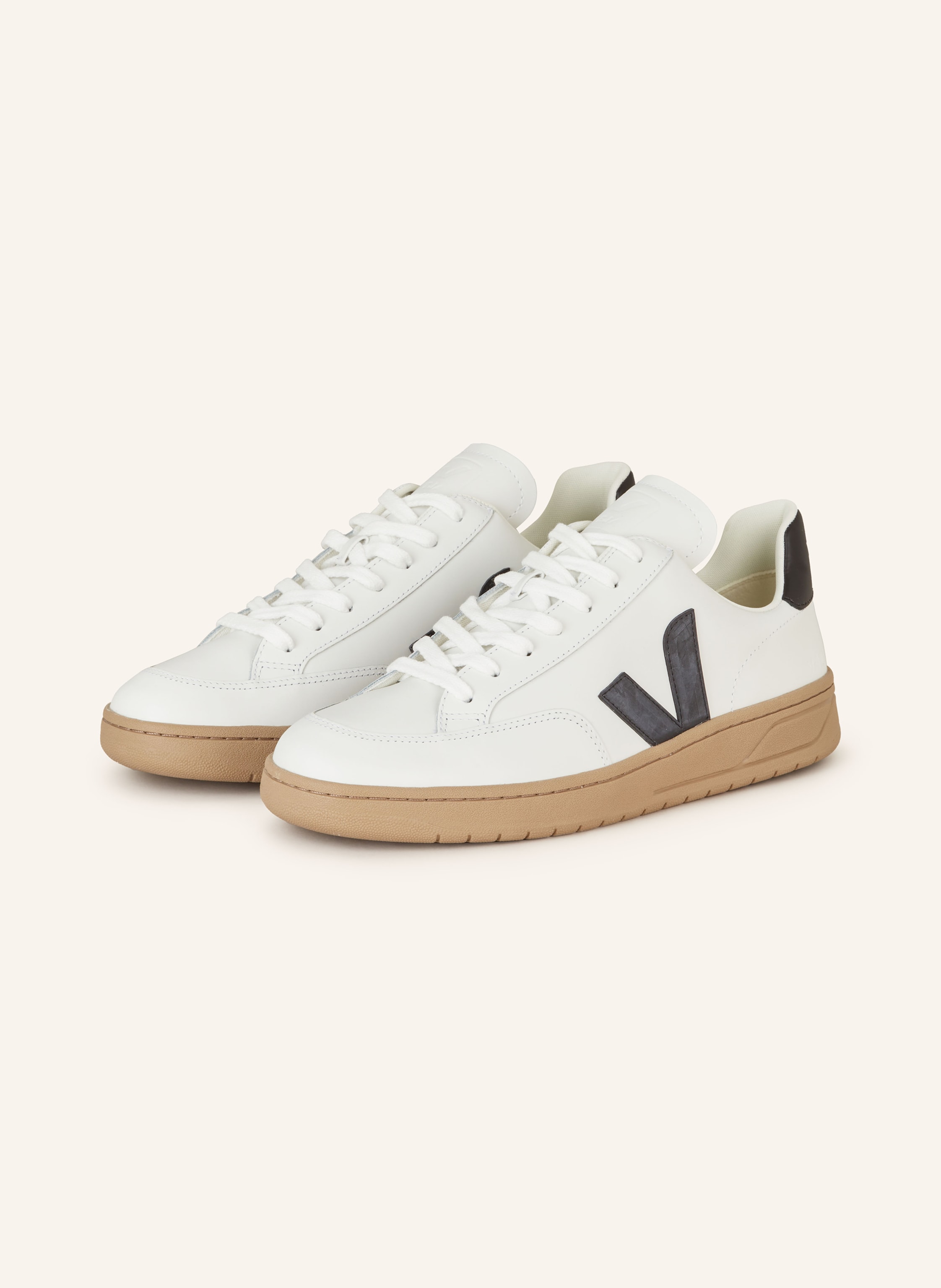 Veja black and white sneakers hot sale