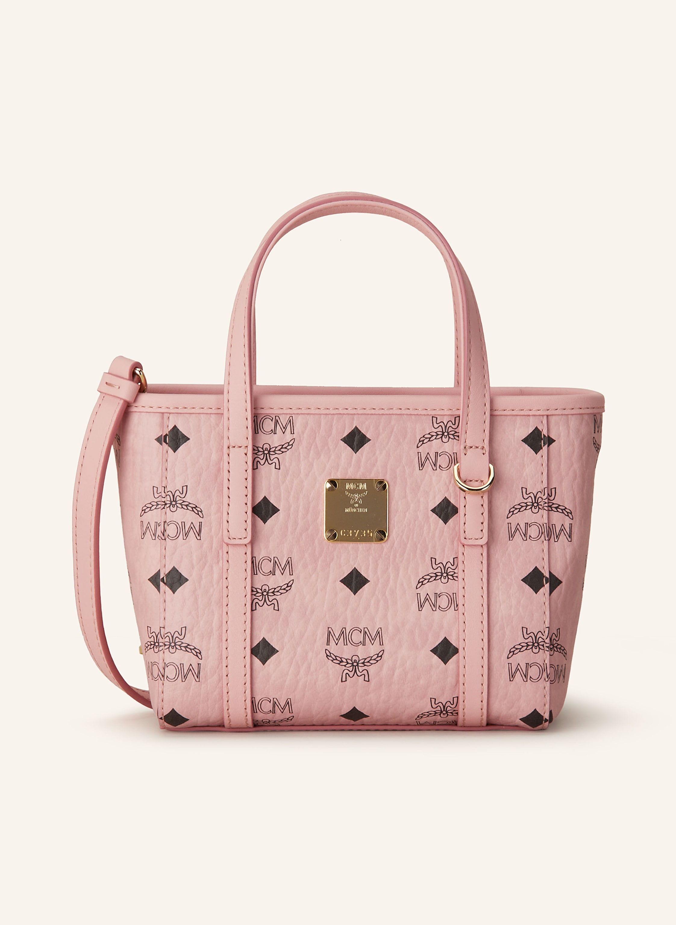 MCM Beschichtetes Canvas. Schließt mit Reißverschluss. Längenverstellbarer, abnehmbarer Schulterriemen. Zwei Tragegriffe. Außenfach hinten. Innen ein Hauptfach. Ein Steckfach für Smartphone & Co. Zwei Kar in rosa / schwarz
