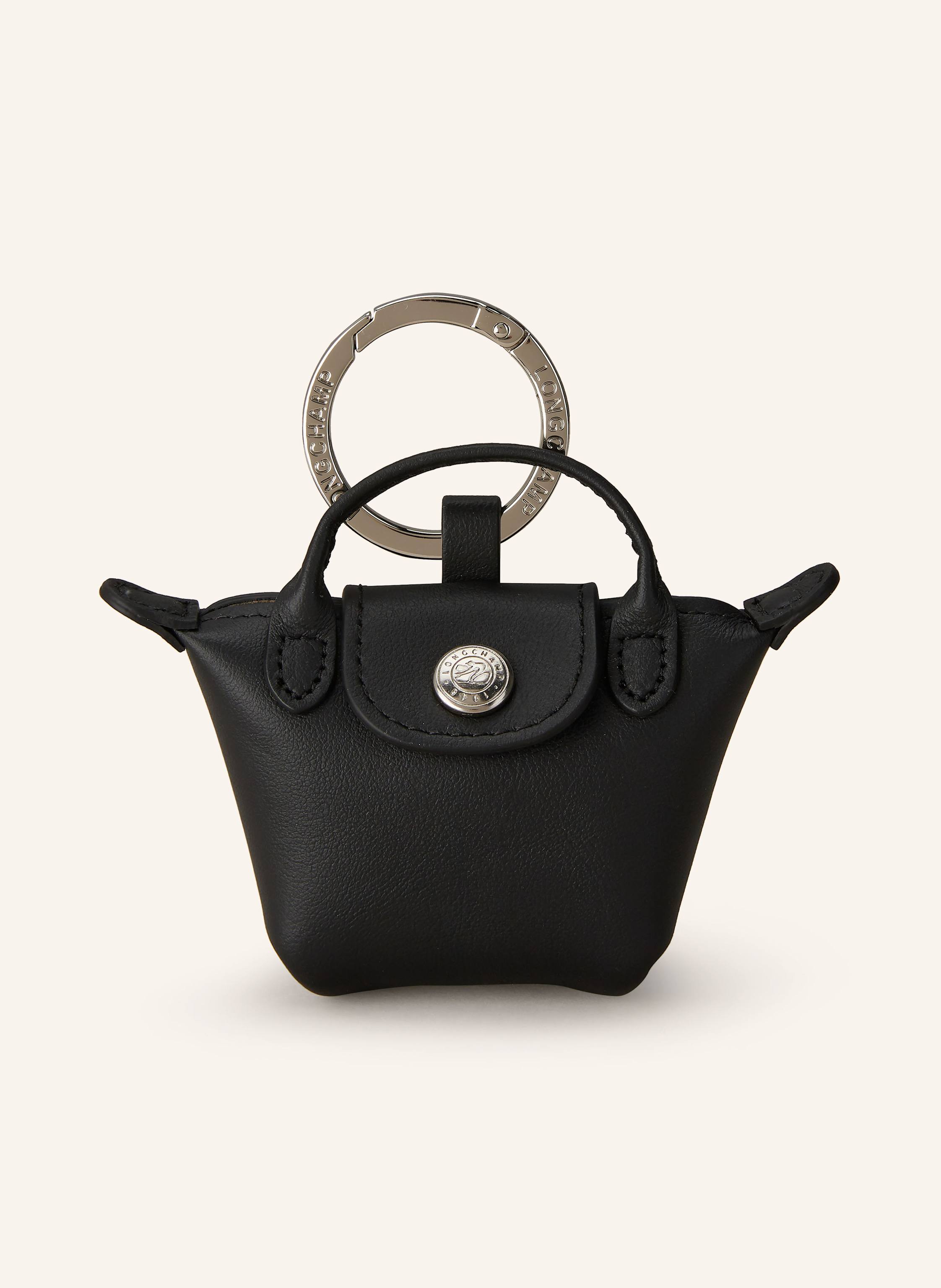Longchamp Mit Geschenkbox. Fein genarbtes Leder. Taschen-Optik. Mit Schlüsselring. Mit Druckknopf verschließbar. Ein Tragegriff. Als Air Pod-Case verwendbar in schwarz