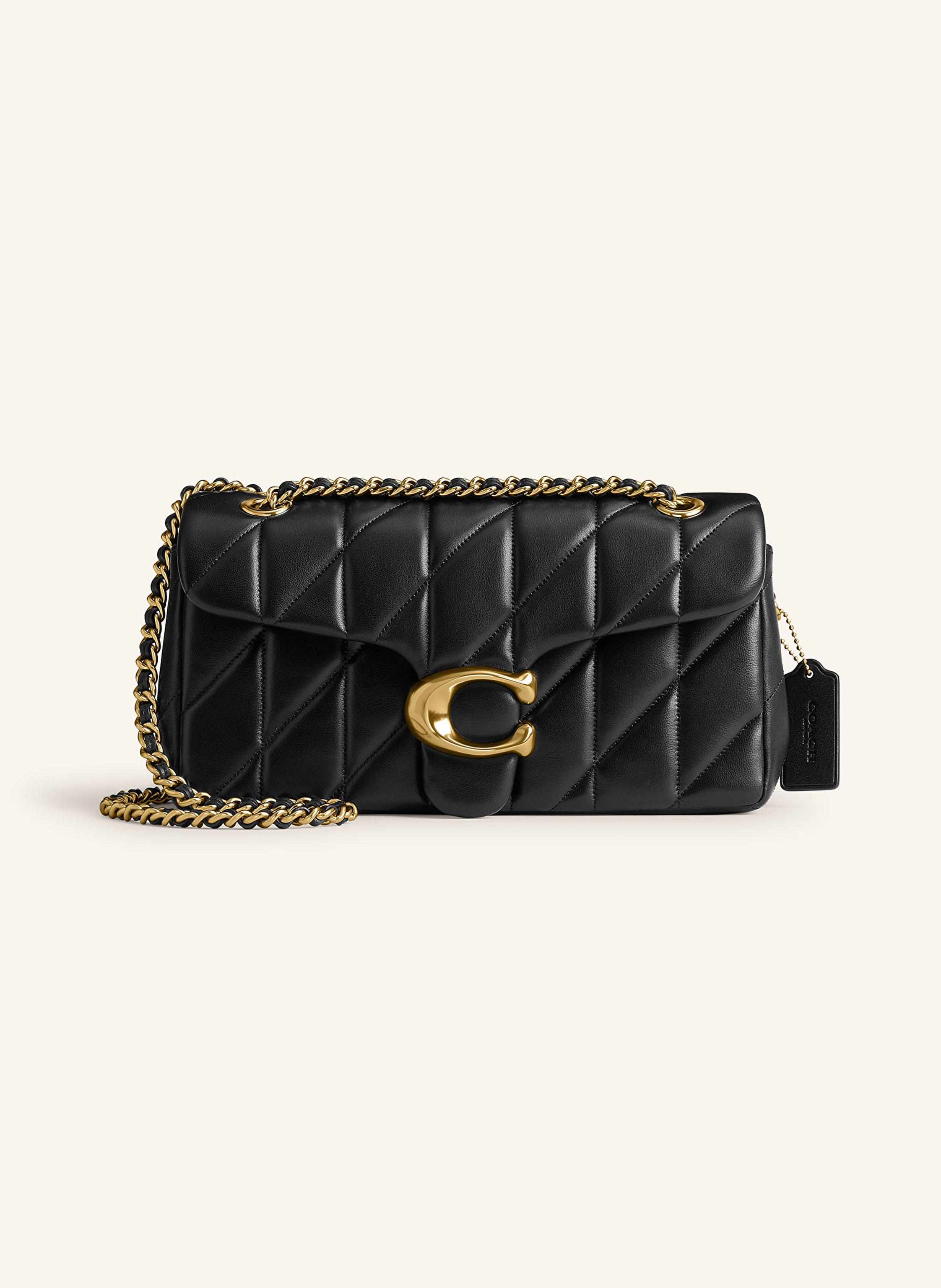 Coach Glattleder. Gestepptes Design. Schließt mit Steckschließe. Schulterkette kann einzeln oder doppelt getragen werden. Außenfach mit Magnetverschluss auf der Vorderseite. Innen zwei Hauptfächer. Innenfac in schwarz