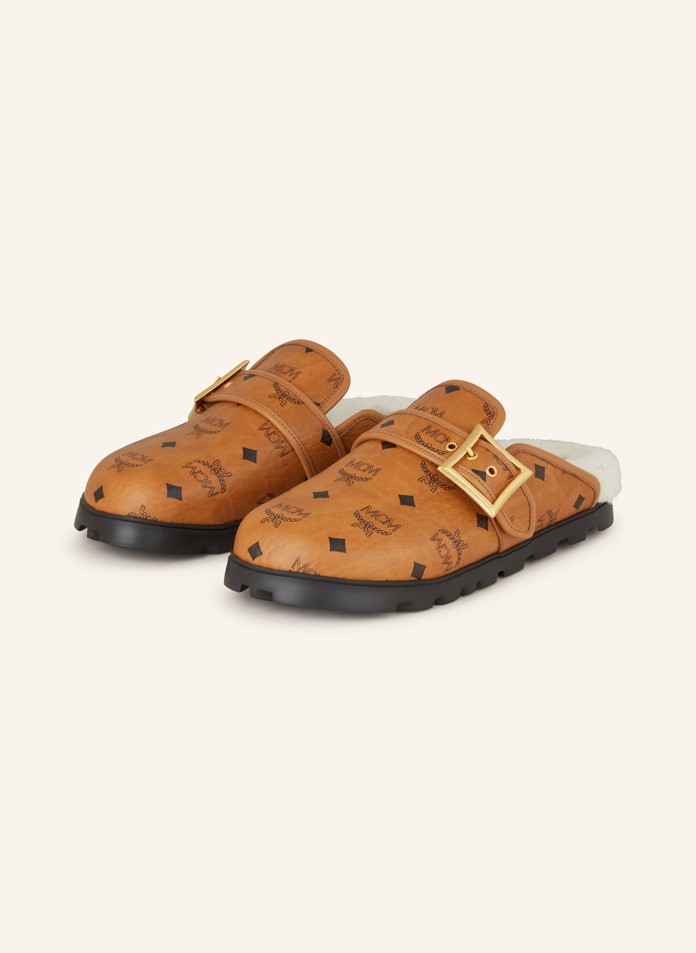 MCM Mules in cognac 