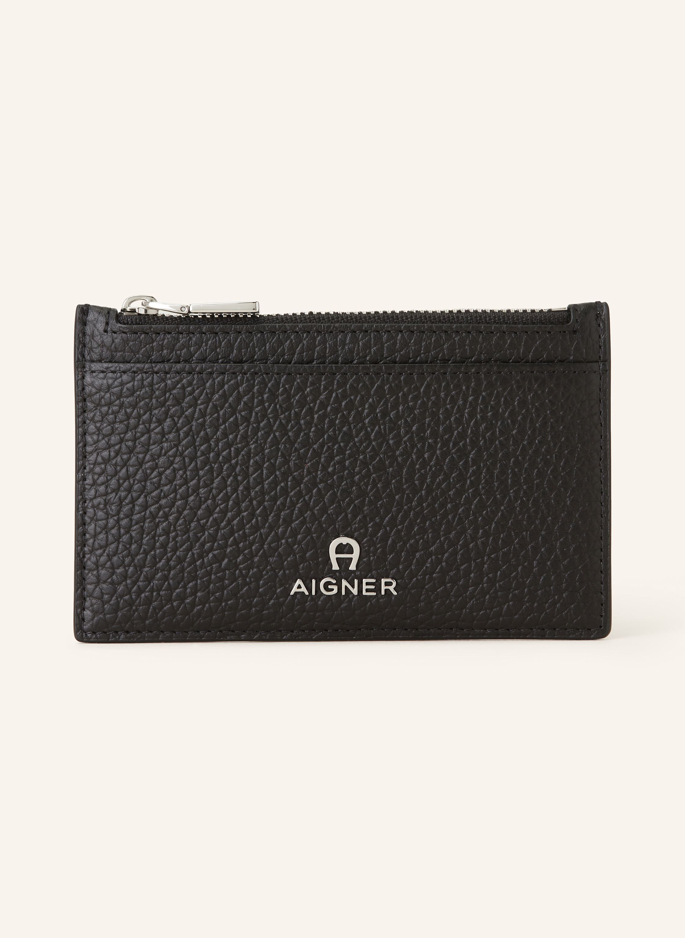 Aigner Genarbtes Leder. Münzfach mit Reißverschluss. Sechs Kartensteckfächer. Label-Badge auf der Front in schwarz