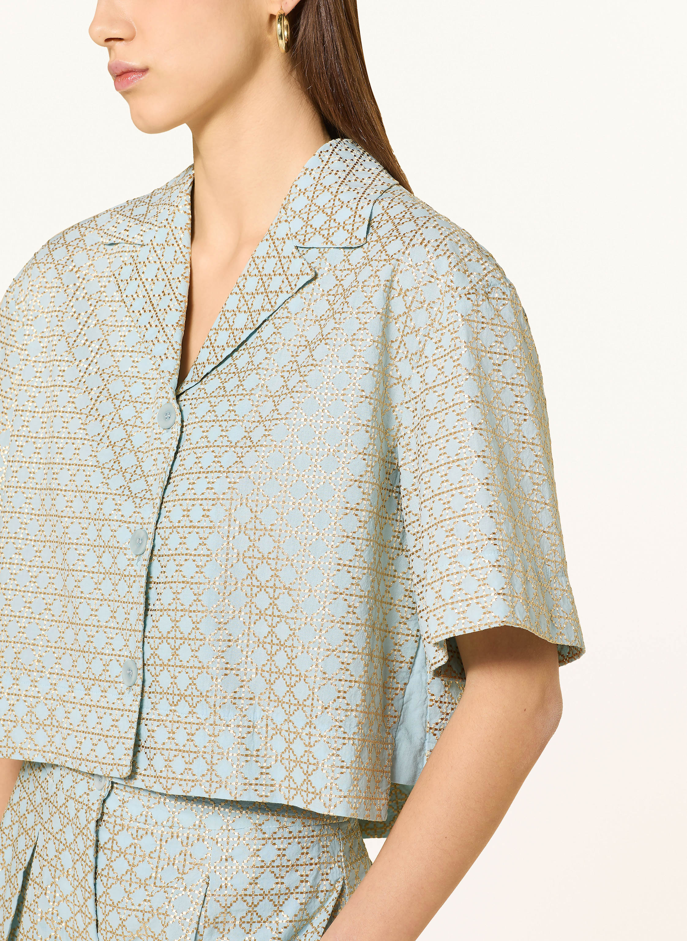 Thumbnail - Greek Archaic Kori Cropped-Bluse Cross Mit Glitzergarn blau