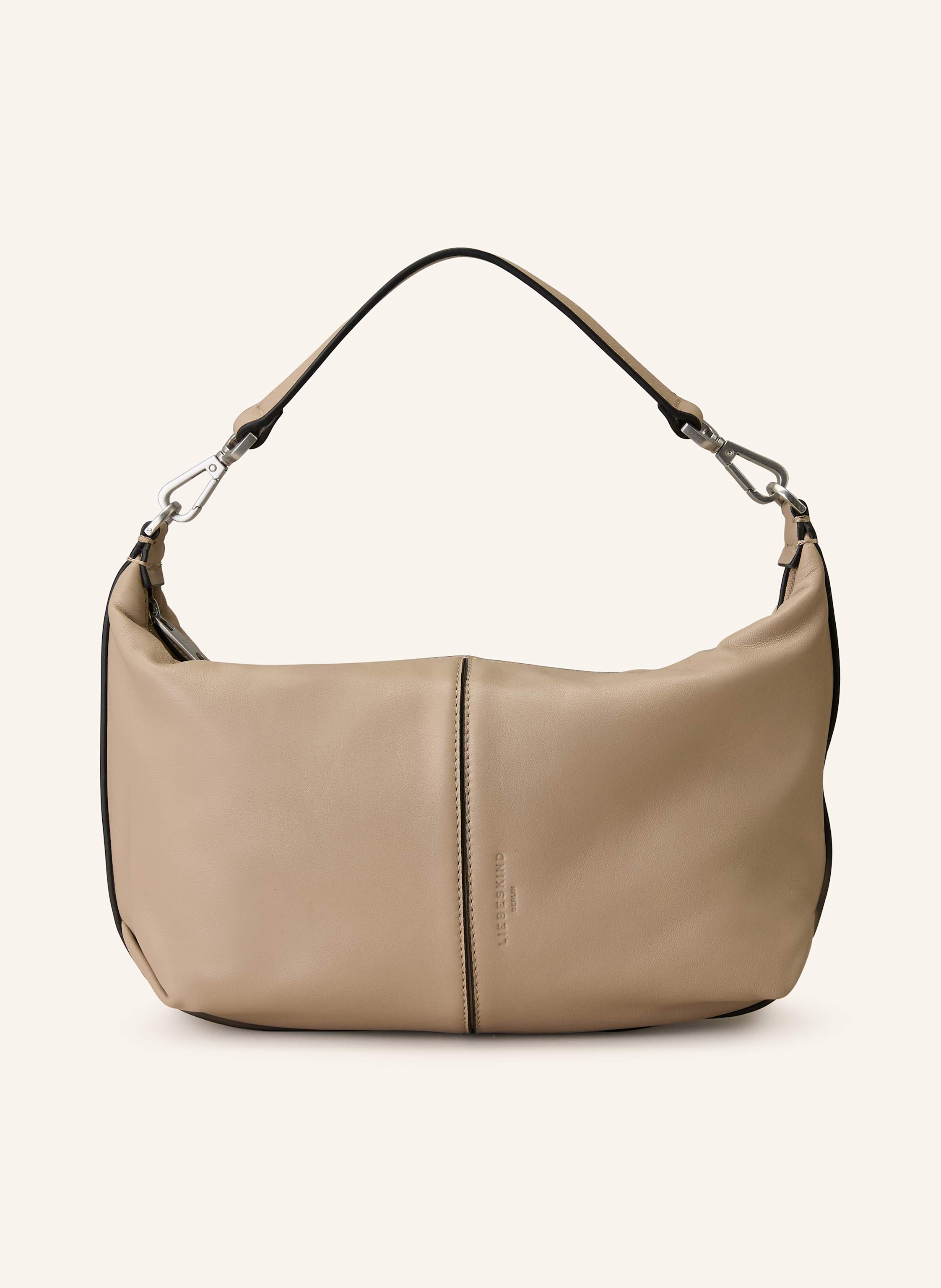Liebeskind Berlin Fein genarbtes Leder. Schließt mit Reißverschluss. Abnehmbarer, längenverstellbarer Schulterriemen. Abnehmbarer Tragegriff. Innen ein Hauptfach. Innenfach mit Reißverschluss Small in beige