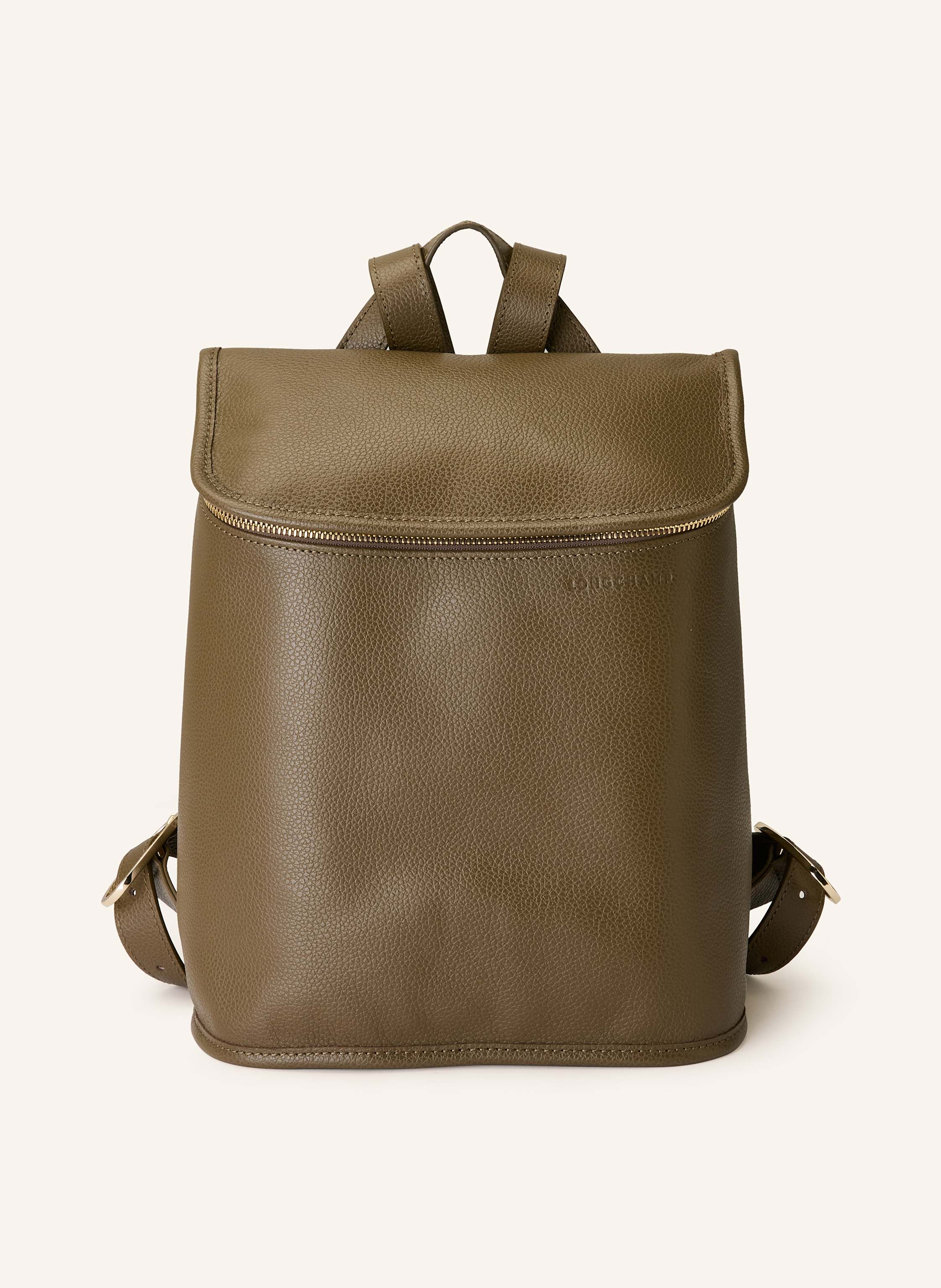 Longchamp Genarbtes Leder. Tragegriff oben. Weitenverstellbare Schulterriemen. Schließt mit Reißverschluss. Ein Hauptfach. Ein Reißverschlussfach innen. Label-Prägung auf der Front in khaki