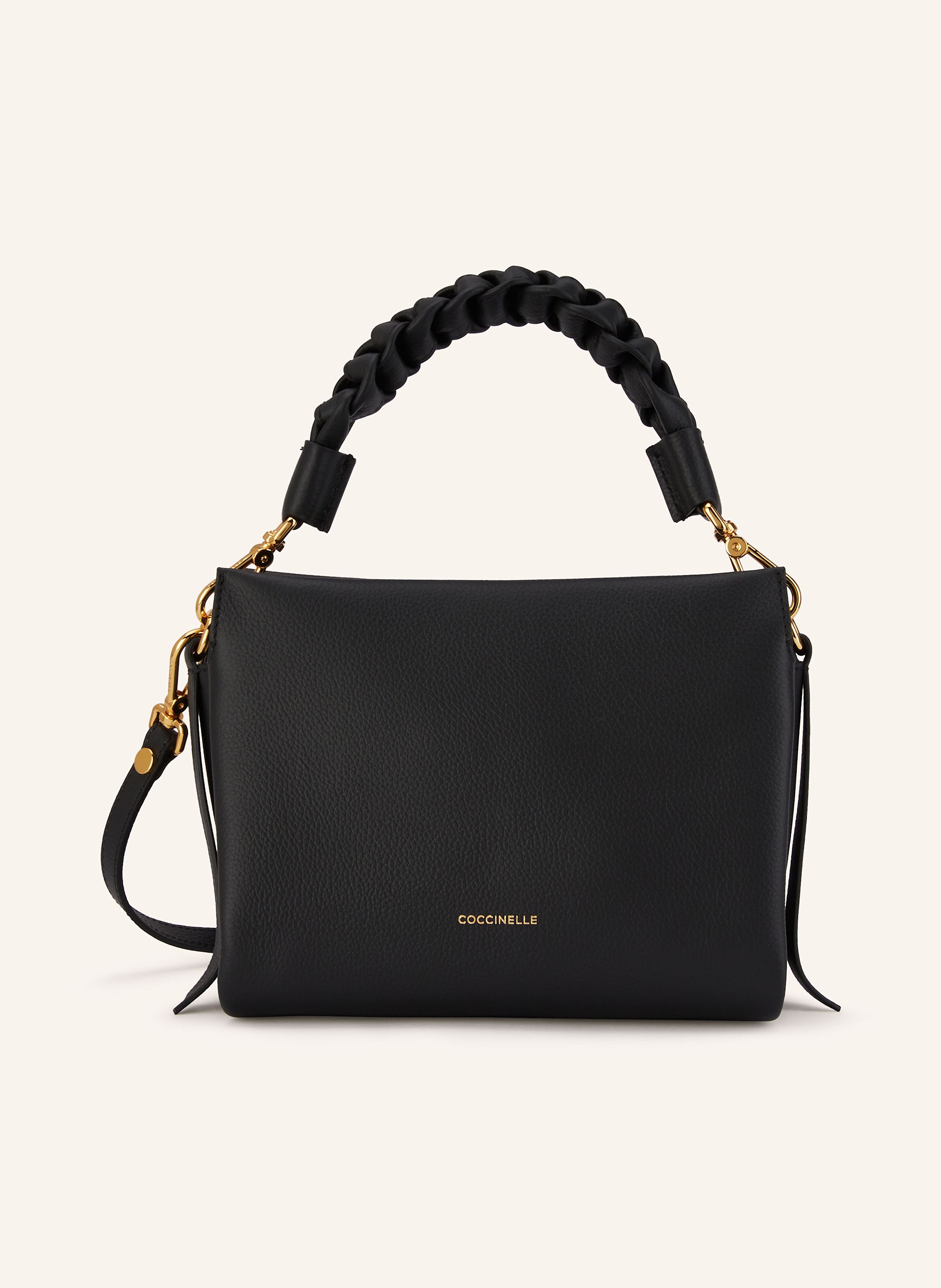 Coccinelle Genarbtes Leder. Schließt mit Reißverschluss und Magnetverschlüssen. Ein abnehmbarer Tragegriff in geflochtenem Design. Abnehmbarer, längenverstellbarer Schulterriemen. Drei Hauptfächer. Innenfach mit in schwarz