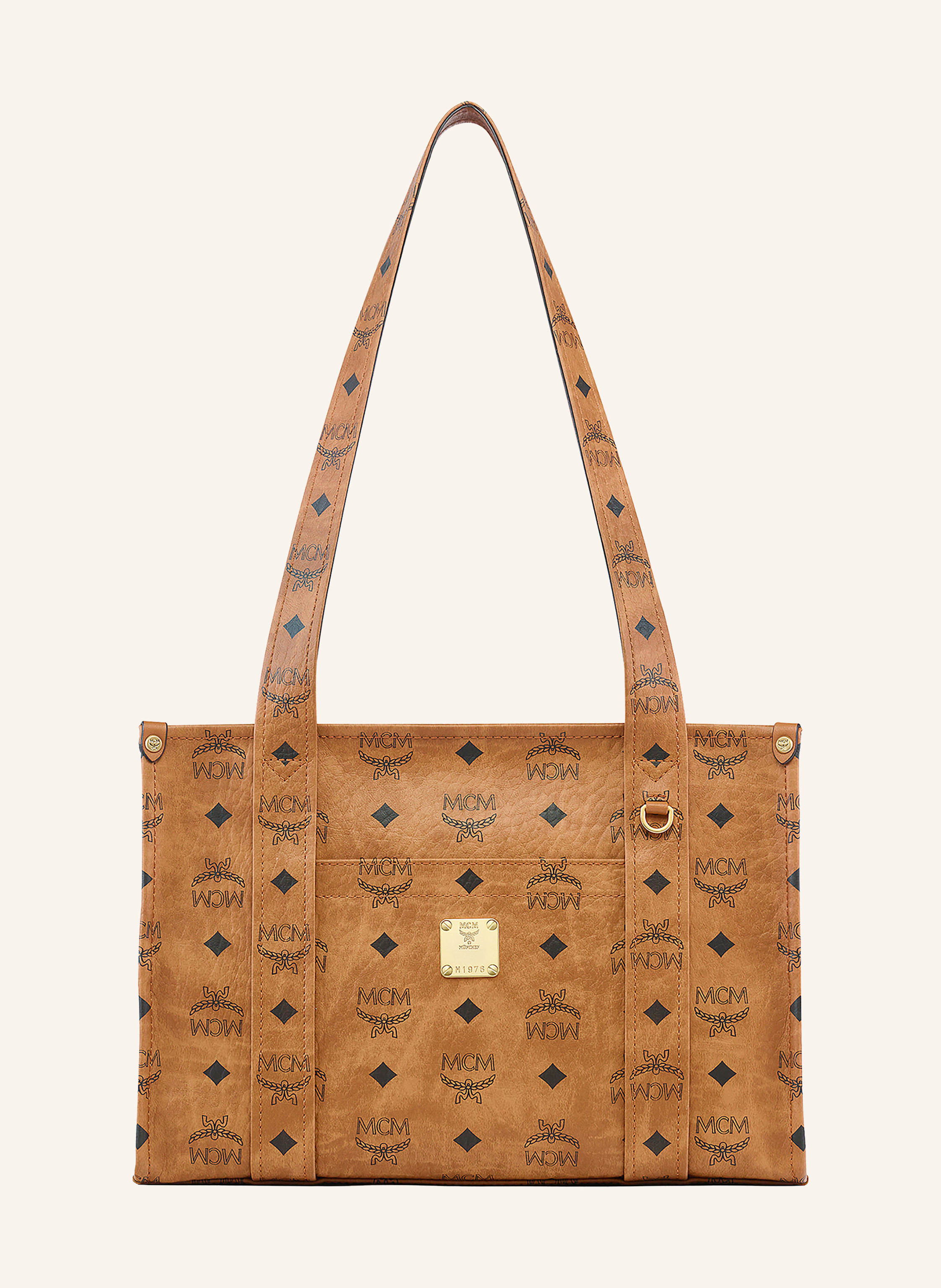 MCM Beschichtetes Canvas. Schließt mit Reißverschluss. Zwei Tragegriffe. Außenfach auf der Vorderseite. Innen ein Hauptfach. Steckfach für Smartphone & Co. Verstärkter Taschenboden. Label-Plakette auf der Small in cognac / schwarz