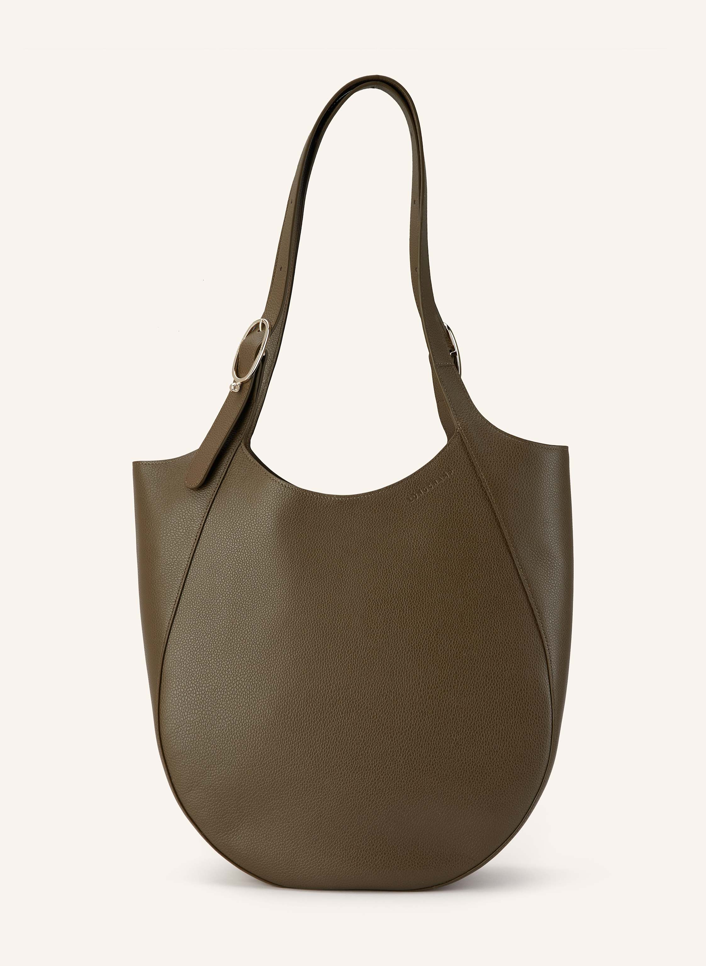 Longchamp Genarbtes Leder. Schließt mit Magnetverschluss. Zwei Tragegriffe. Innen ein Hauptfach. Innenfach mit Reißverschluss. Verstärkter Taschenboden. Label-Prägung auf der Front in khaki