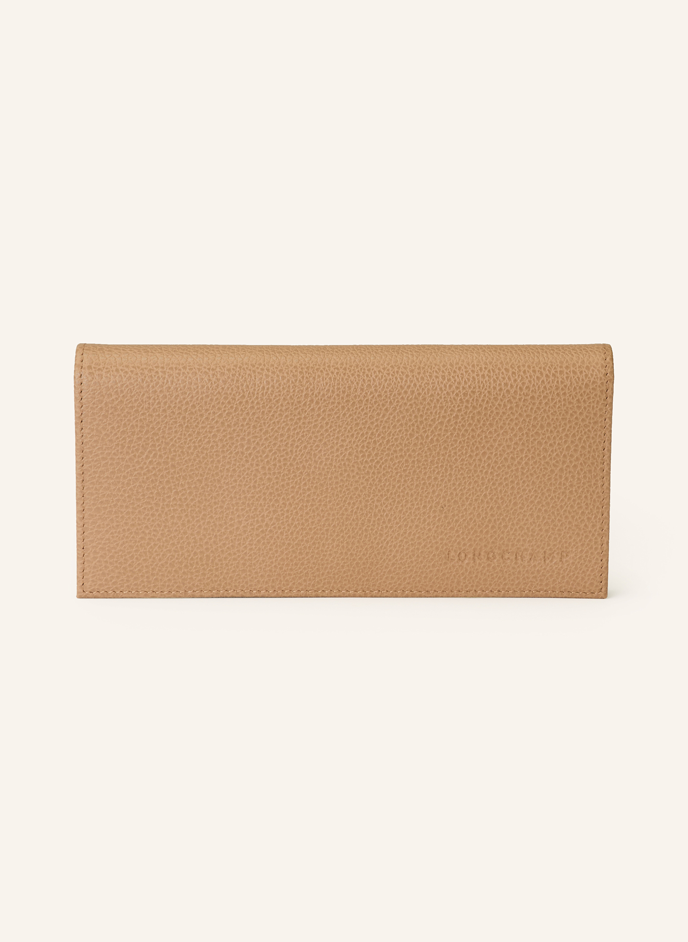 Longchamp Genarbtes Leder. Schließt mit Druckknopf. Münzfach mit Reißverschluss. Drei Innenfächer. Vierzehn Steckfächer. Label-Prägung auf der Front in hellbraun