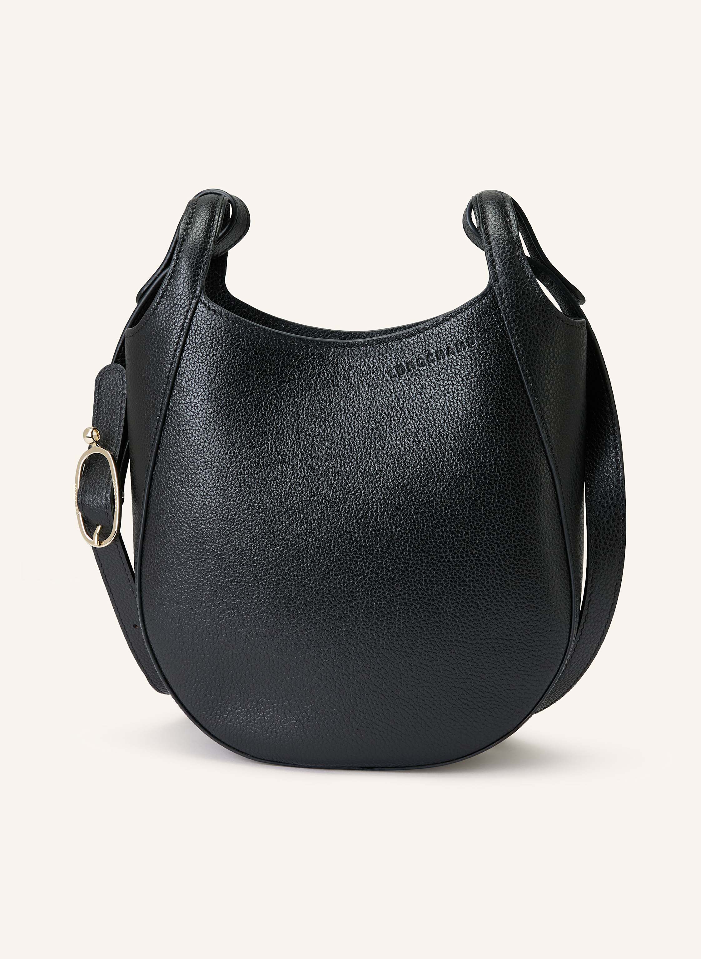 Longchamp Genarbtes Leder. Schließt mit Magnetverschluss. Innenfach mit Reißverschluss. Ein Steckfach. Label-Details Small in 001 schwarz