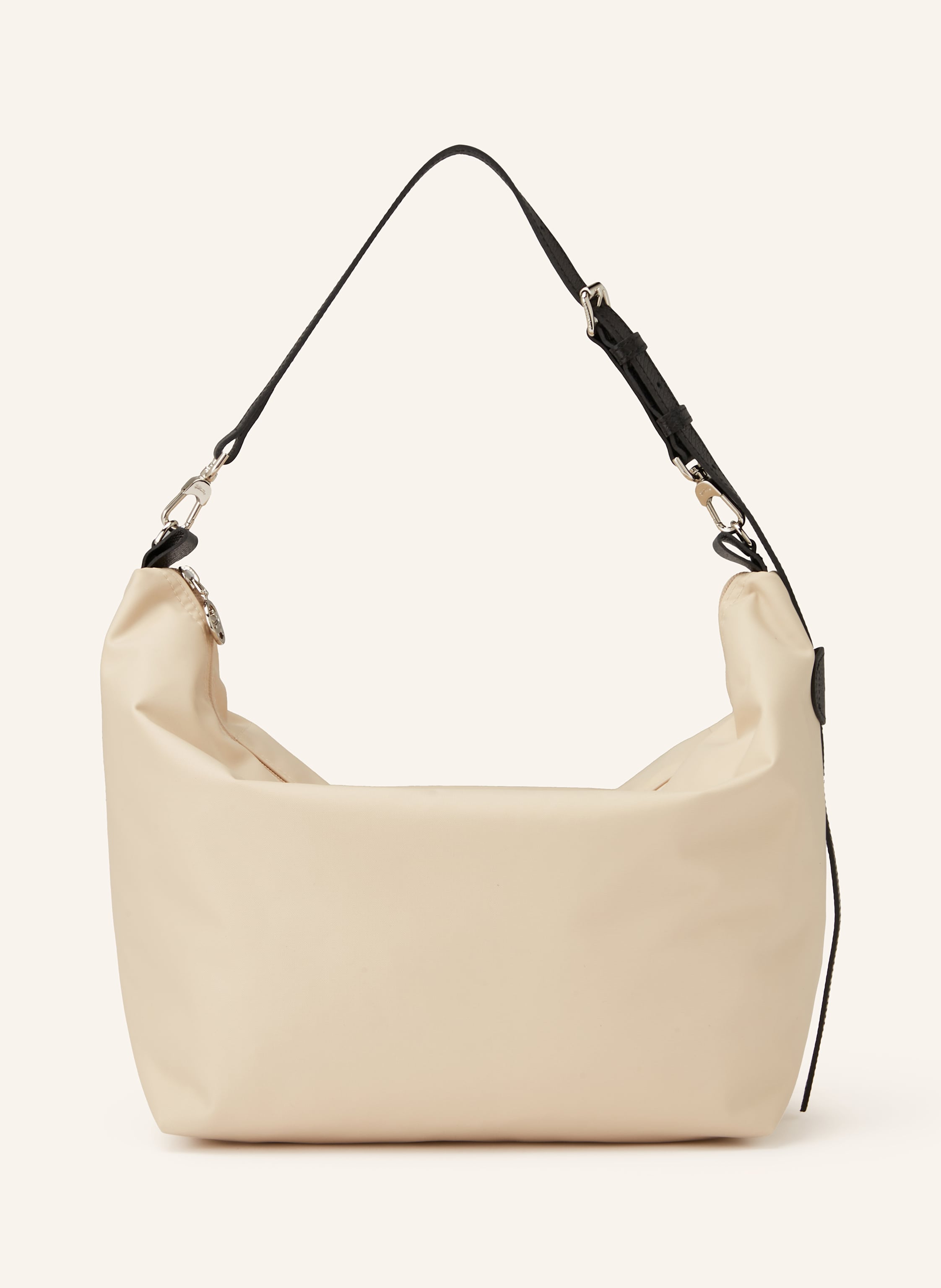 Longchamp Textil. Schließt mit Reißverschluss. Abnehmbarer, längenverstellbarer Schulterriemen. Innen ein Hauptfach. Innenfach mit Reißverschluss. Ein Steckfach in creme