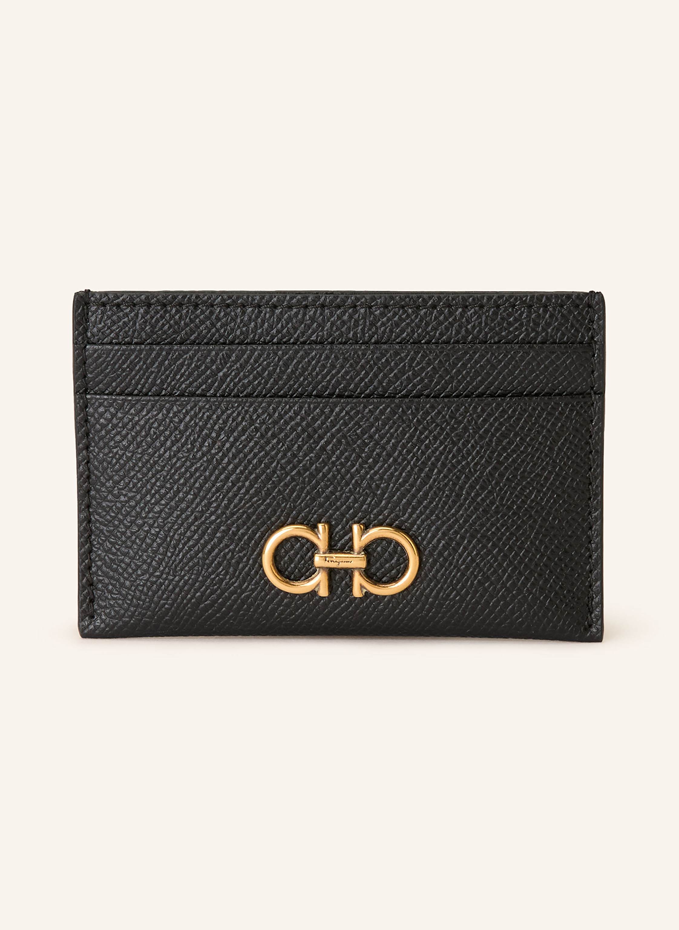 Ferragamo Genarbtes Leder. Fünf Kartenfächer. Goldfarbene Hardware. Logo-Detail auf der Front. Label-Print auf der Rückseite. Made in Italy in schwarz