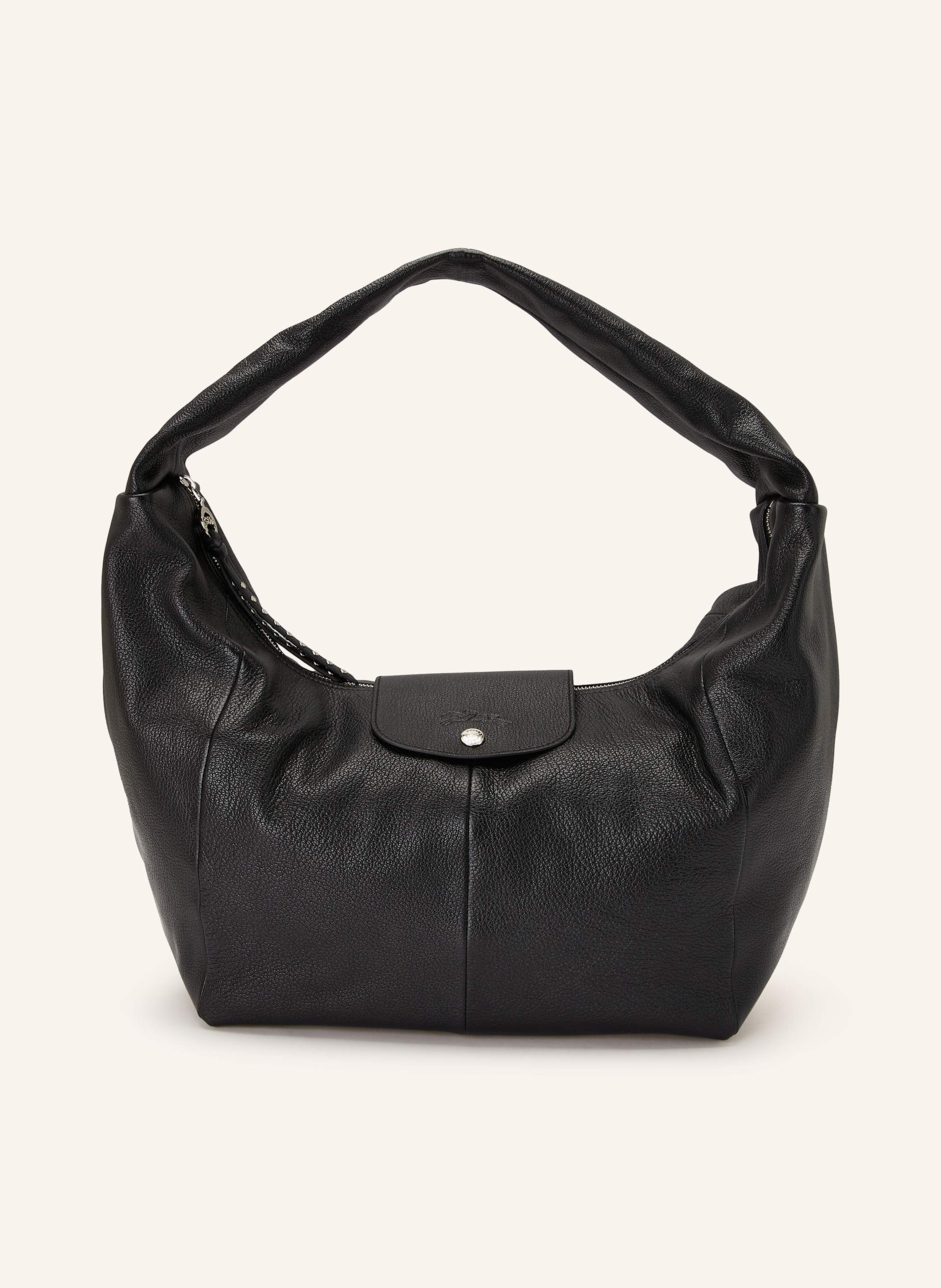 Longchamp Genarbtes Leder. Schließt mit Reißverschluss und Druckknopf. Schulterriemen. Innen ein Hauptfach. Innenfach mit Reißverschluss. Ein Steckfach. Label-Prägung auf dem Überschlag Large in schwarz