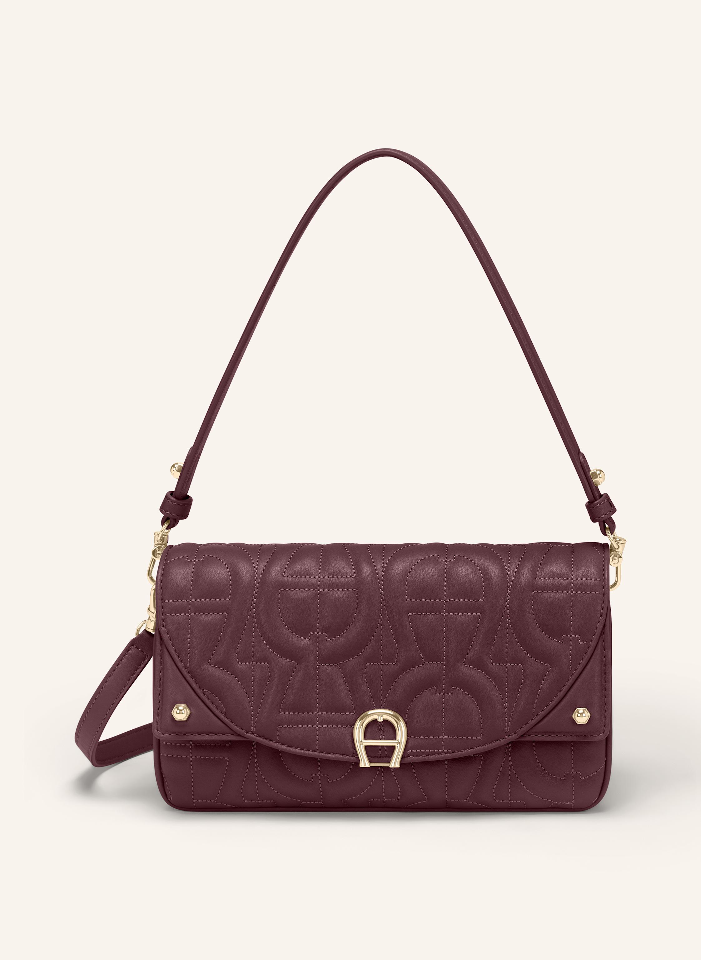 Aigner Die Diadora steht für Understatement in seiner schönsten Form. Mit ihrer klaren Silhouette und den fein glänzenden Akzenten begleitet sie Sie stilvoll durch den Tag – ein Modell, das Eleganz und Leich in dunkelrot