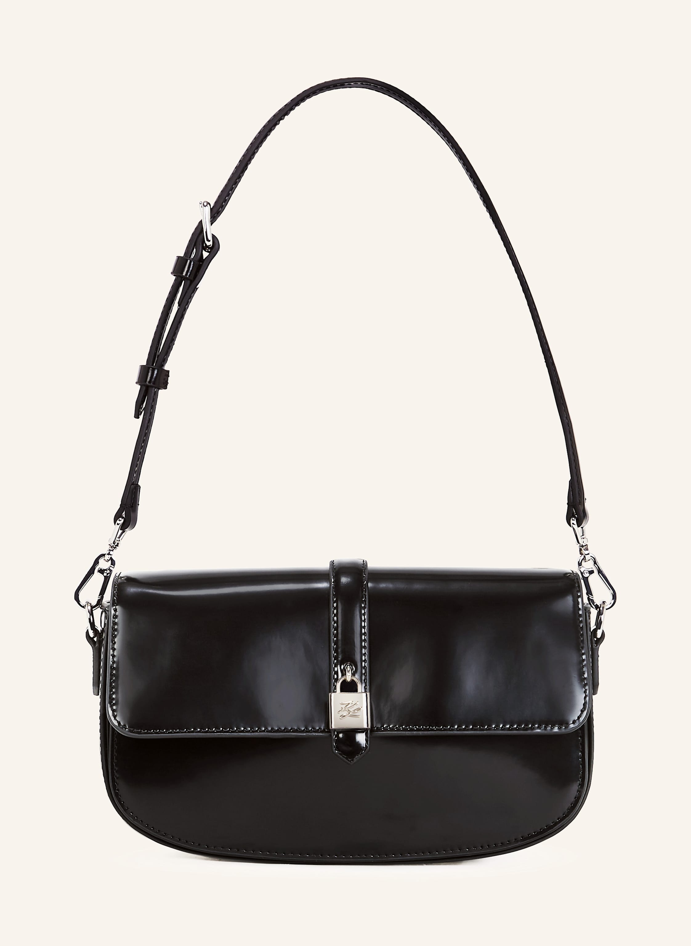 Karl Lagerfeld Diese Umhängetasche ist aus luxuriösem, glänzendem Leder gefertigt und strahlt zeitlose Weiblichkeit mit einem modernen Touch aus. Der elegante Style mit eleganter Umschlagklappe und verstellbarem Rie in schwarz