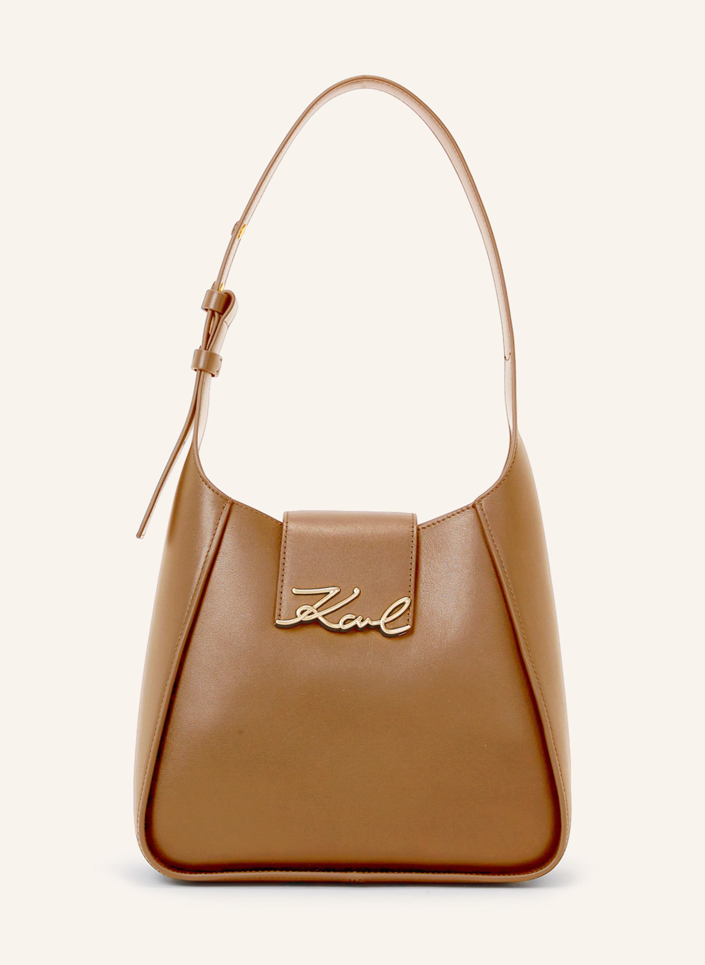 Karl Lagerfeld Die K/SIGNATURE Hobo-Tasche aus Glattleder mit einem geräumigen Innenleben sorgt dafür, dass Ihre wichtigsten Alltagsgegenstände stets griffbereit sind. Elegante KARL-Signatur-Beschläge verleihen dies in camel