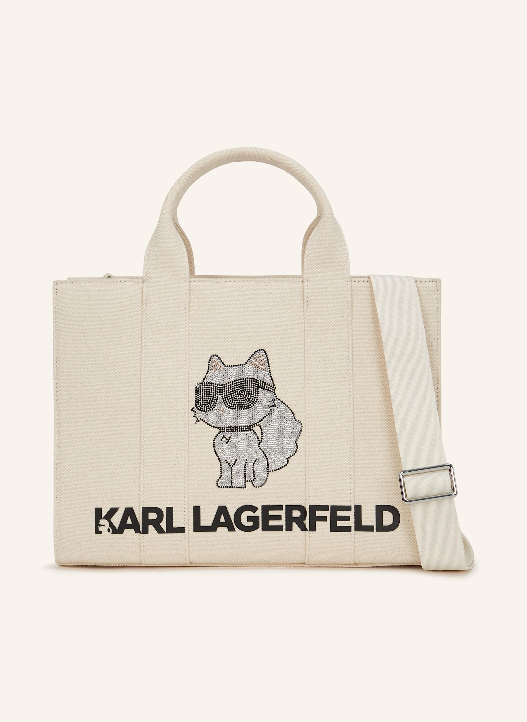 Karl Lagerfeld Eine Tote-Bag aus Canvas mit quadratischer Silhouette, funkelnden Strassmotiven und zwei Tragegriffen. Perfekt als Alltagsaccessoire mit einem Hauch verspielter Eleganz. Quadratische Silhouette. Zwei in beige