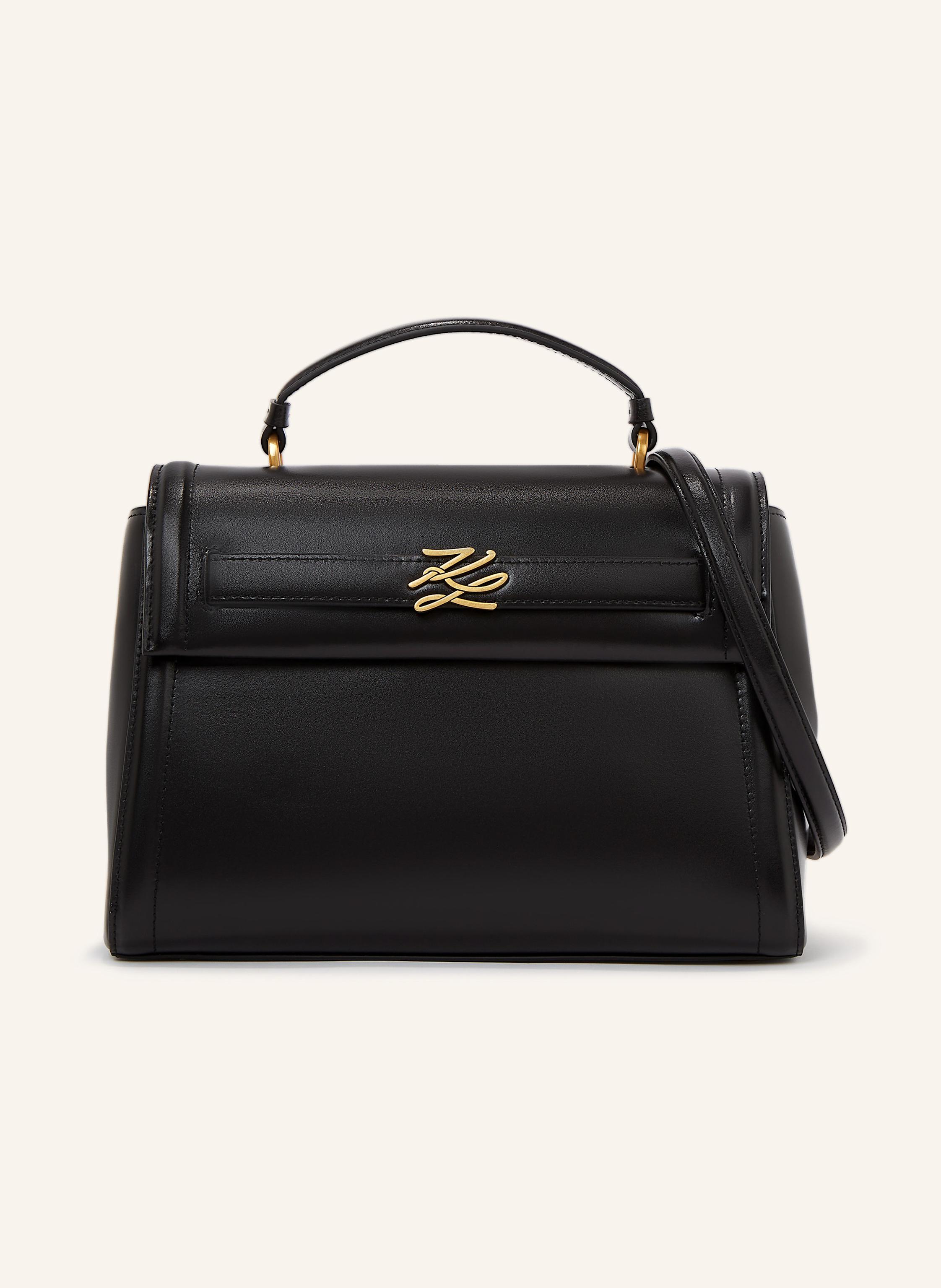 Karl Lagerfeld Diese zeitlose Tasche mit Tragegriff oben ist aus hochwertigem italienischem Leder gefertigt und mit eleganten Karl-Autogramm-Beschlägen versehen. Mit einer eleganten Umschlagklappe und einem vielseit in schwarz/ gold
