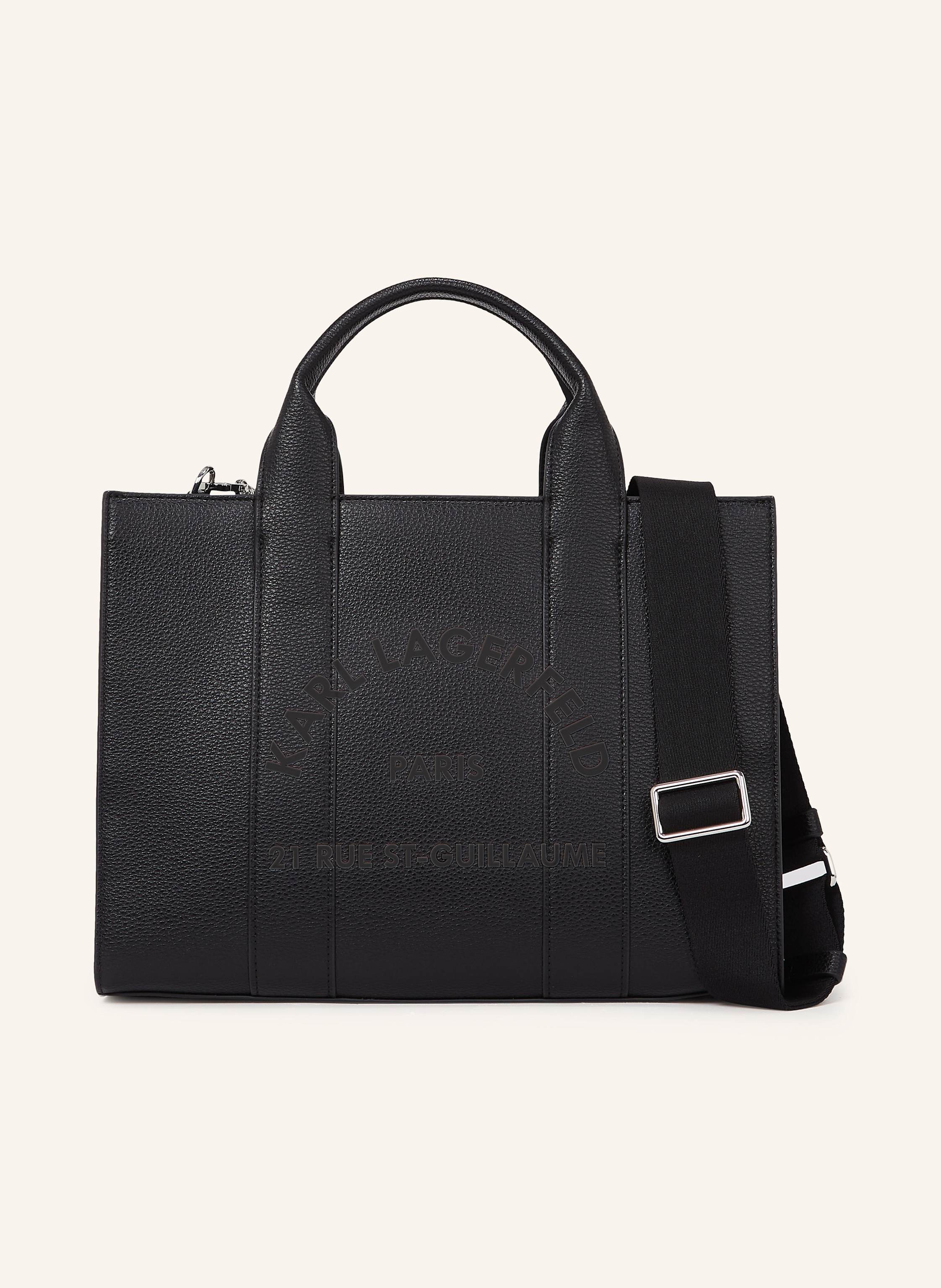 Karl Lagerfeld Die Rue St-Guillaume Tote Bag verbindet moderne Eleganz mit Funktionalität. Ihre zeitgenössische Silhouette wird durch zwei Tragegriffe und einen abnehmbaren Crossbody-Riemen für ein vielseitiges Styl in schwarz