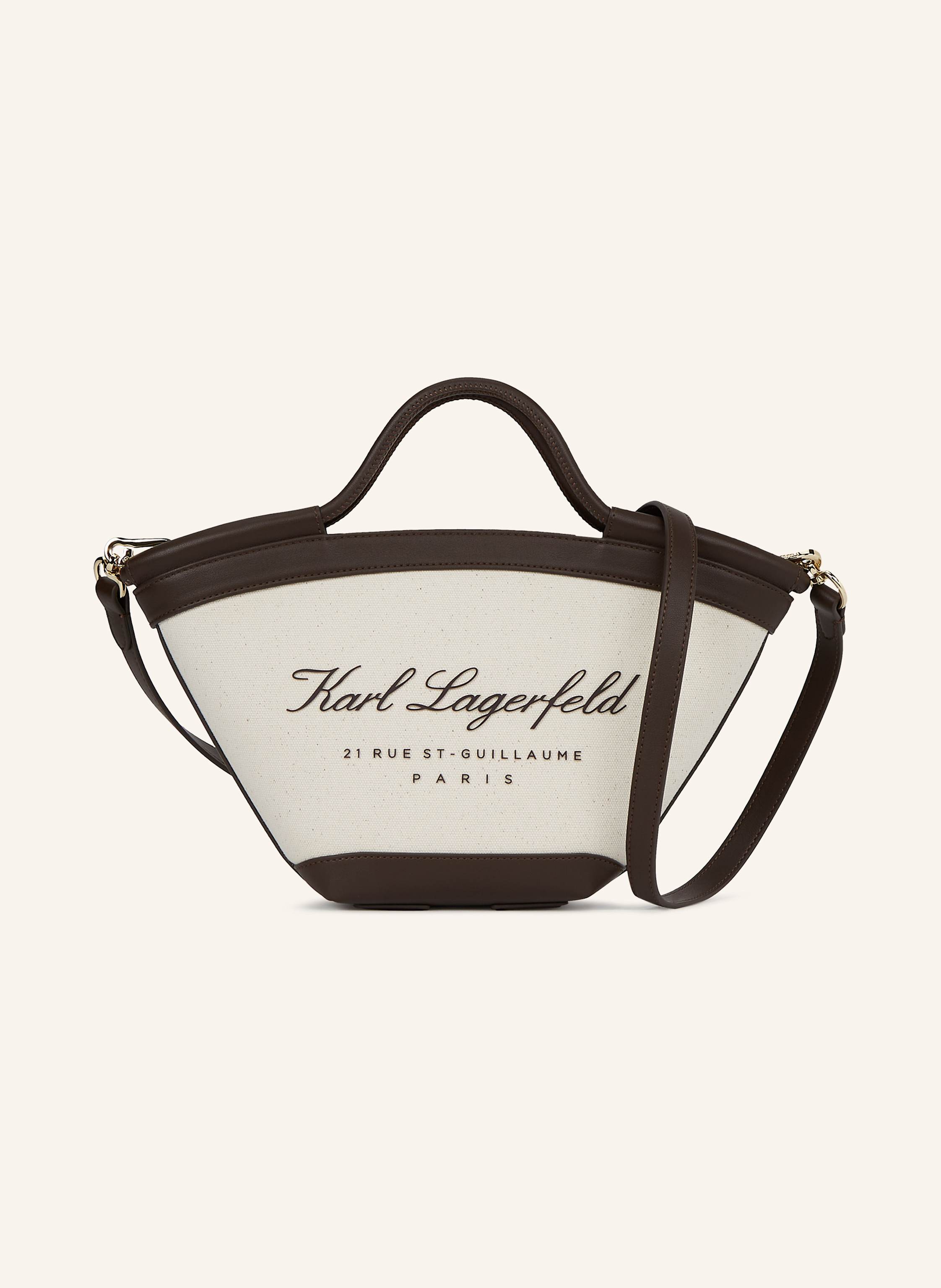 Karl Lagerfeld Eine tulpenförmige Tote Bag für den Strand mit zierlichem Flair. Besätze aus technischem Leder verleihen Struktur, während ein abnehmbarer Riemen mühelos Vielseitigkeit bietet. Tulpenförmige, zierlich in beige