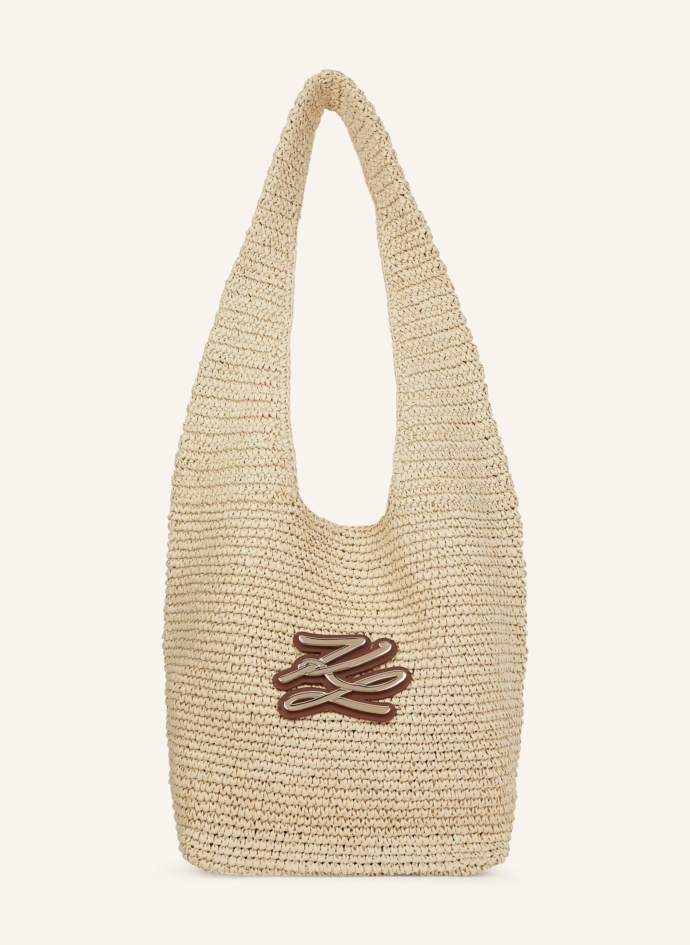 Karl Lagerfeld Diese übergroße, gehäkelte Hobo-Tasche steht für modisches Beach-Styling. Ihr geräumiges Innenleben und das schicke Lederlogo verbinden praktische Funktionalität mit einem raffinierten Touch. Struktur in beige