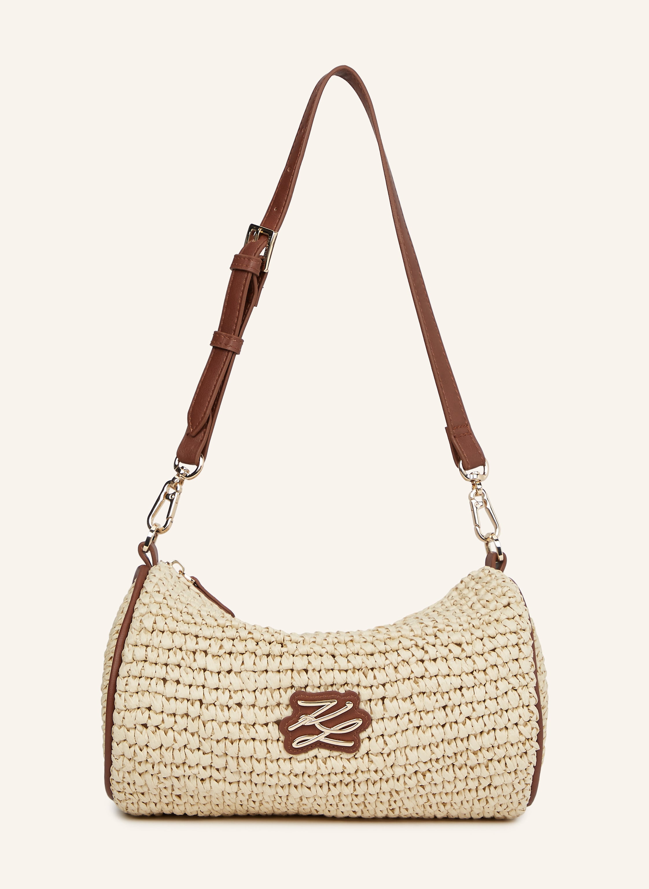 Karl Lagerfeld Eine strukturierte, gehäkelte Tasche mit abnehmbarem Riemen, die sich nahtlos von einer Schultertasche in eine Clutch verwandeln lässt. Eine auffällige Autograph-Logoverzierung aus Leder und Metall ve in beige